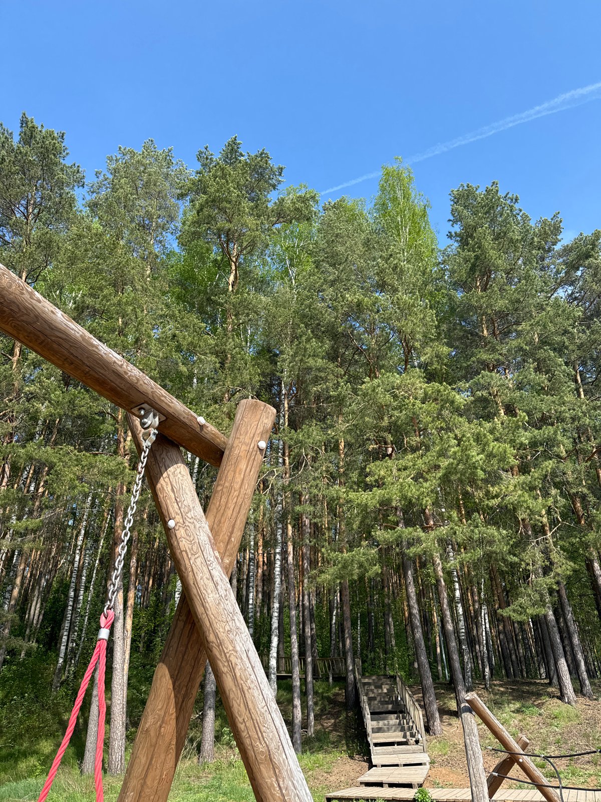 Toddler plays at park playground in Chaikovsky, Russia