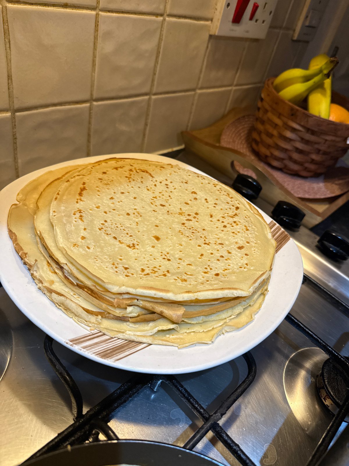Home cook prepares crepes and cucumbers in Great Yarmouth kitchen