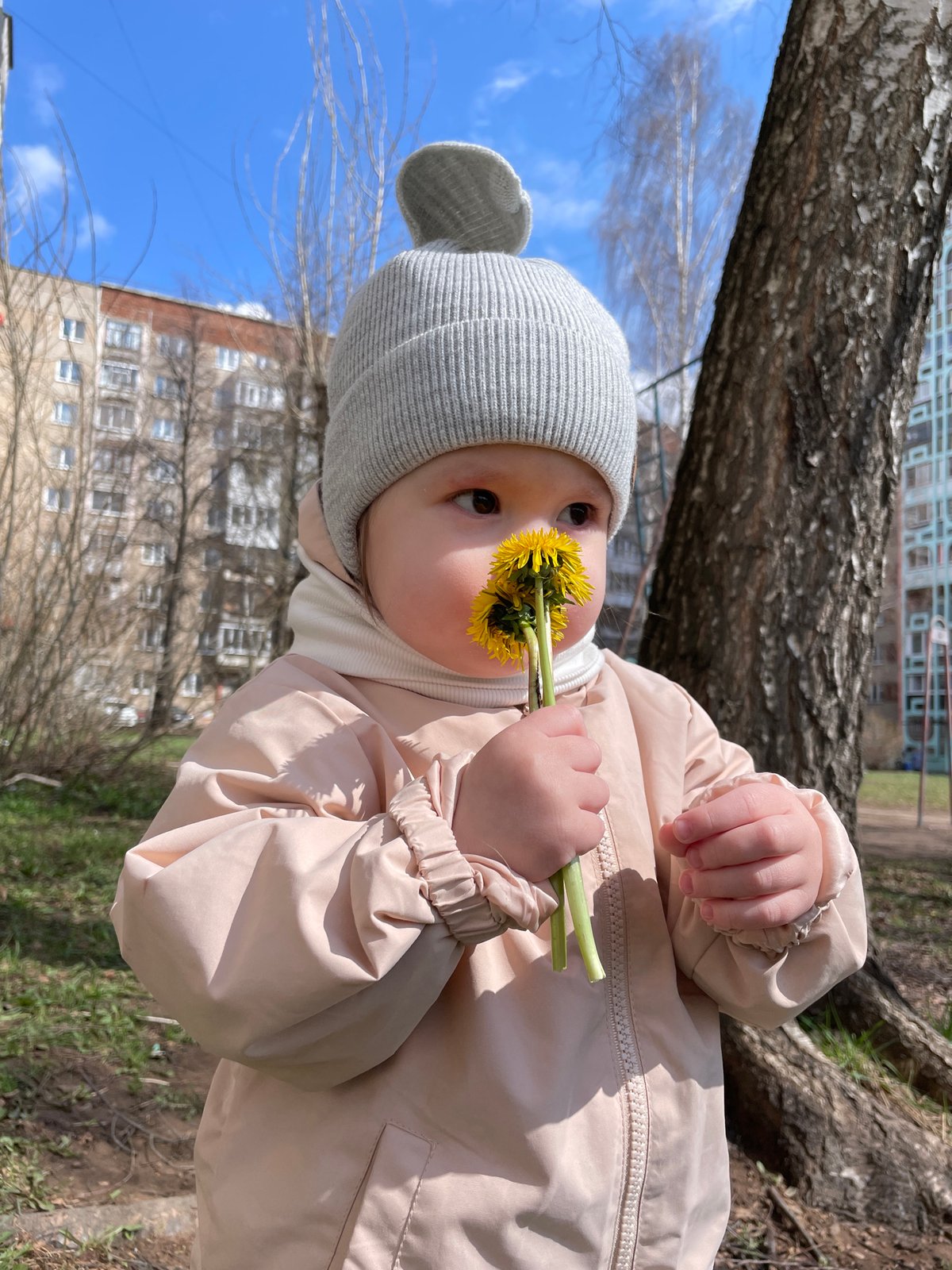 Mother, baby enjoy spring morning at Izhevsk playground