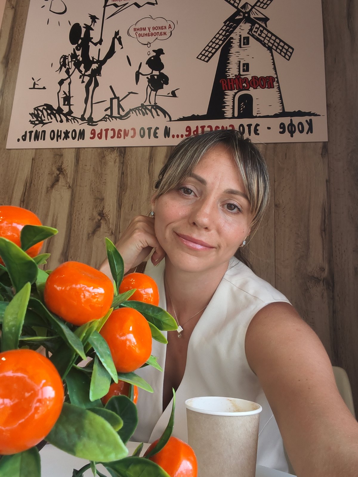 Coffee break selfies outside a Sochi café