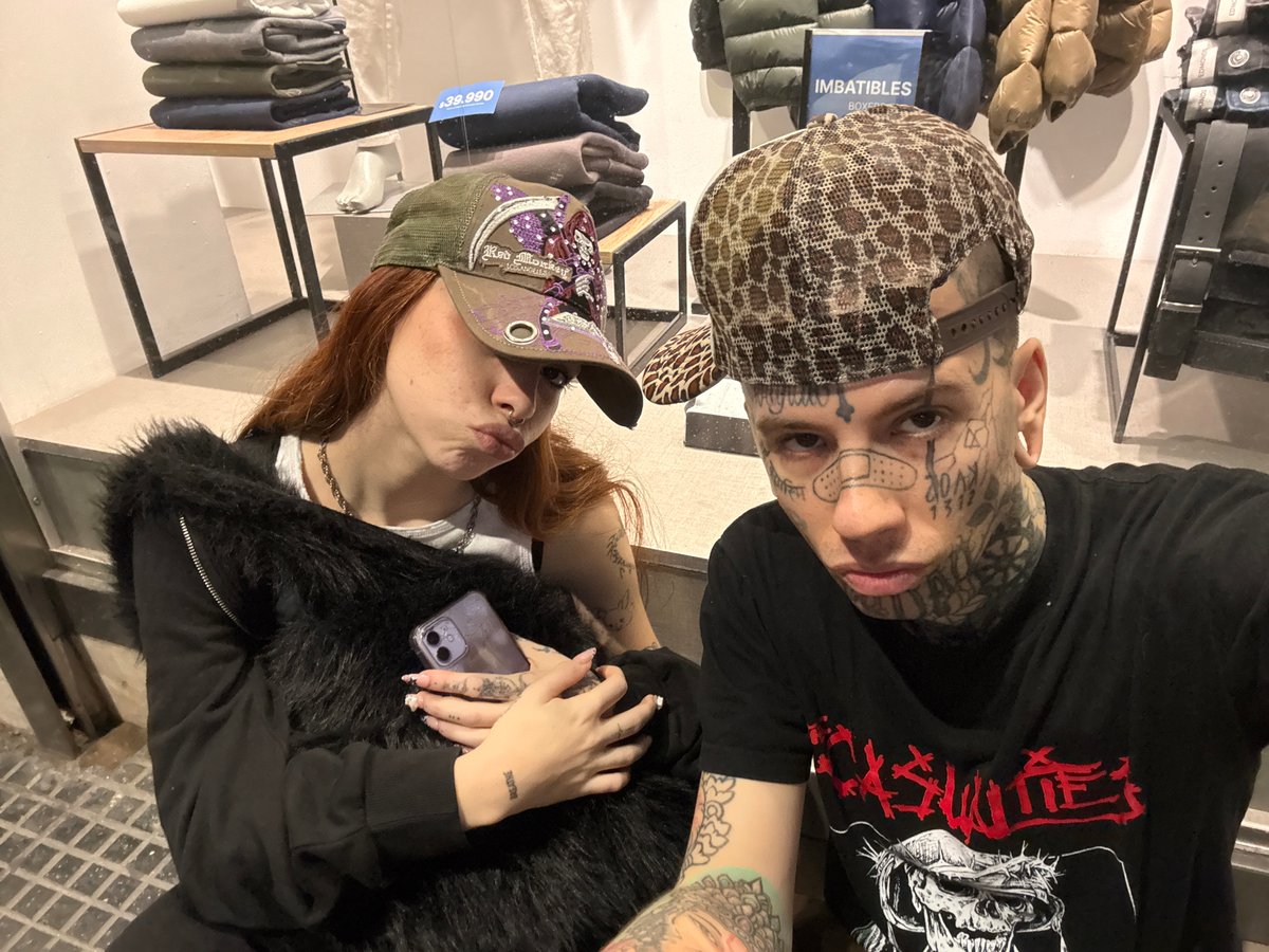Two people photographed in Buenos Aires retail location