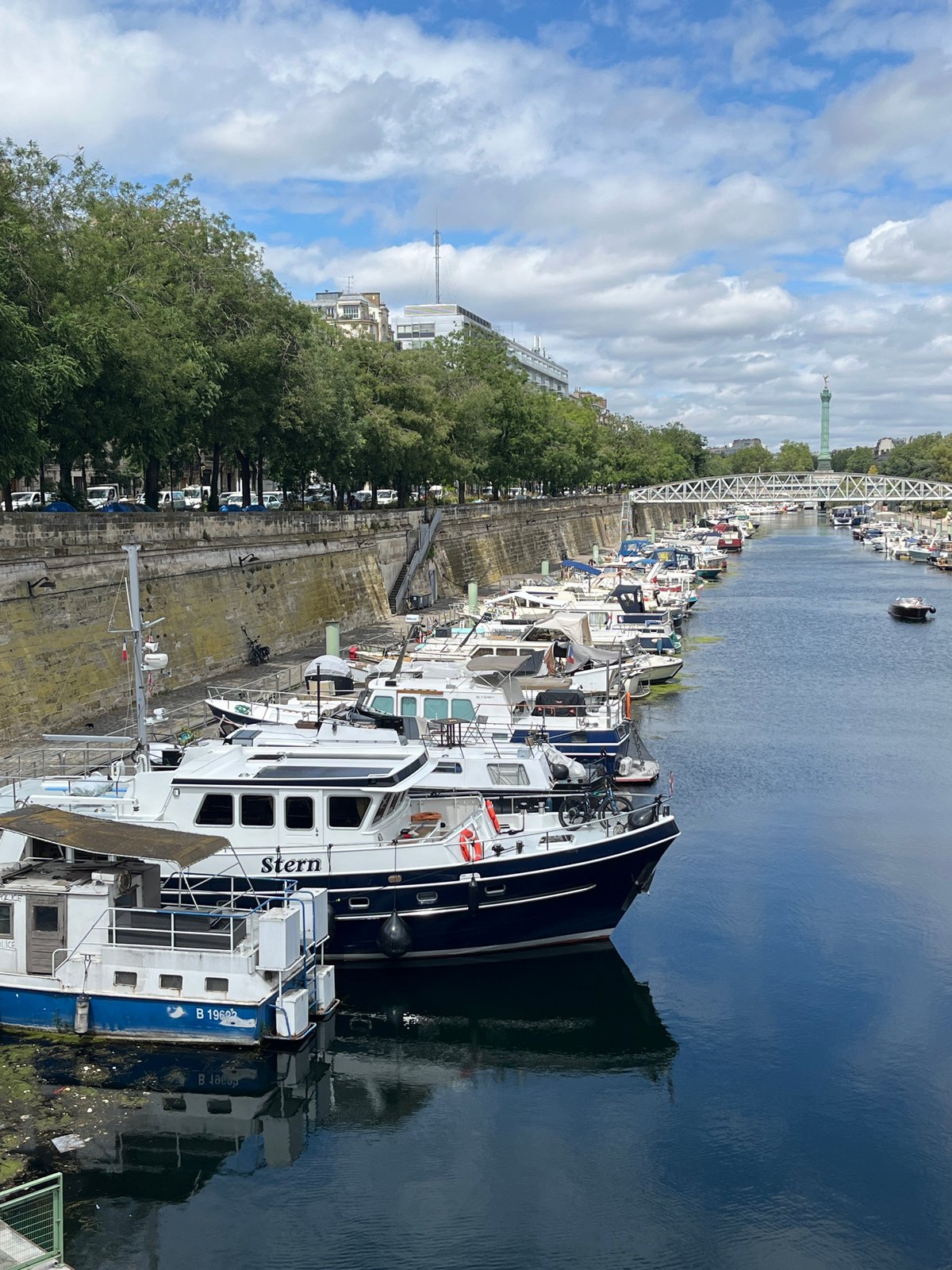 Boats and bicycle barges docked at Bassin de l'Arsenal, Paris