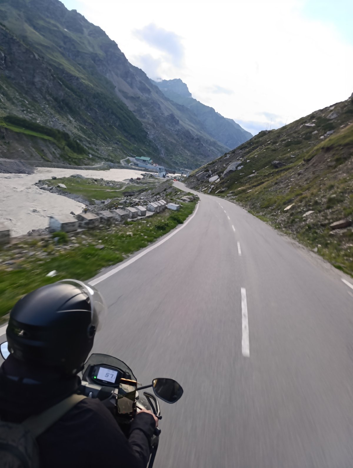 Riding a paved mountain road through Burwa, India