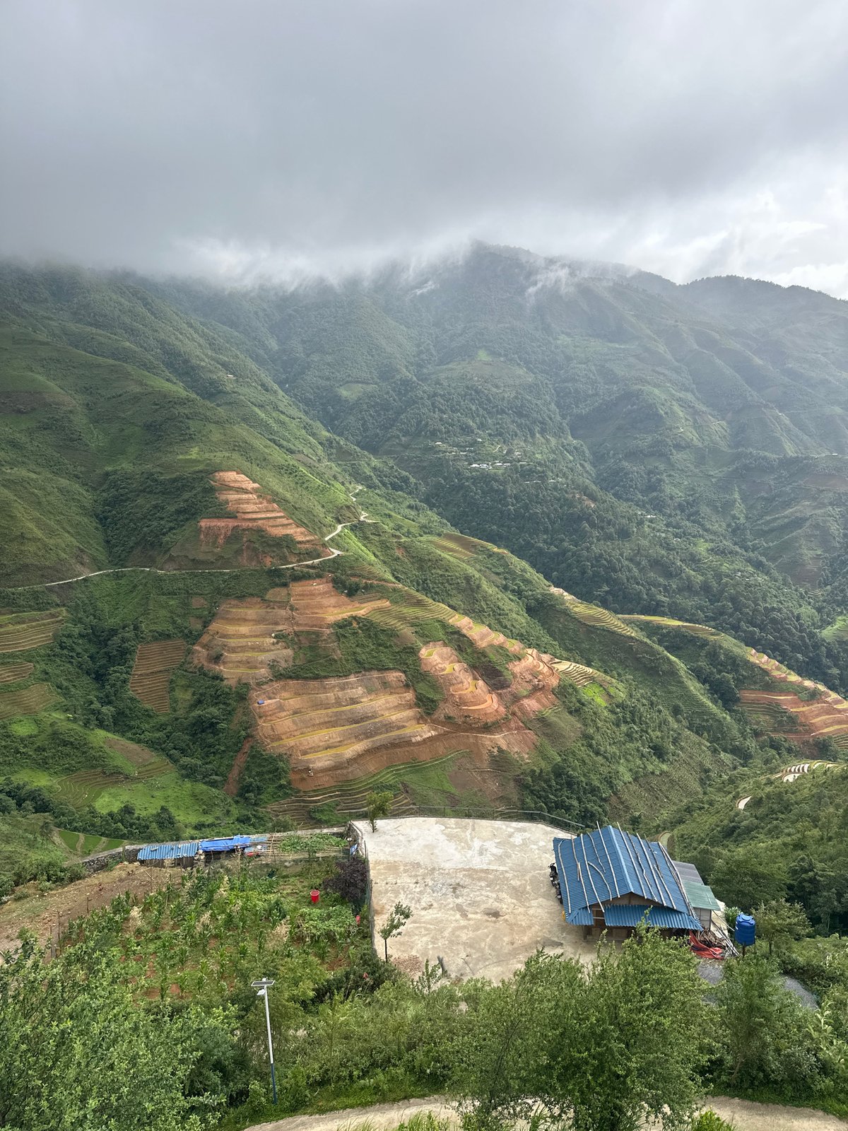 Rural dwelling photographed amid Ta Xua's terraced mountain landscape