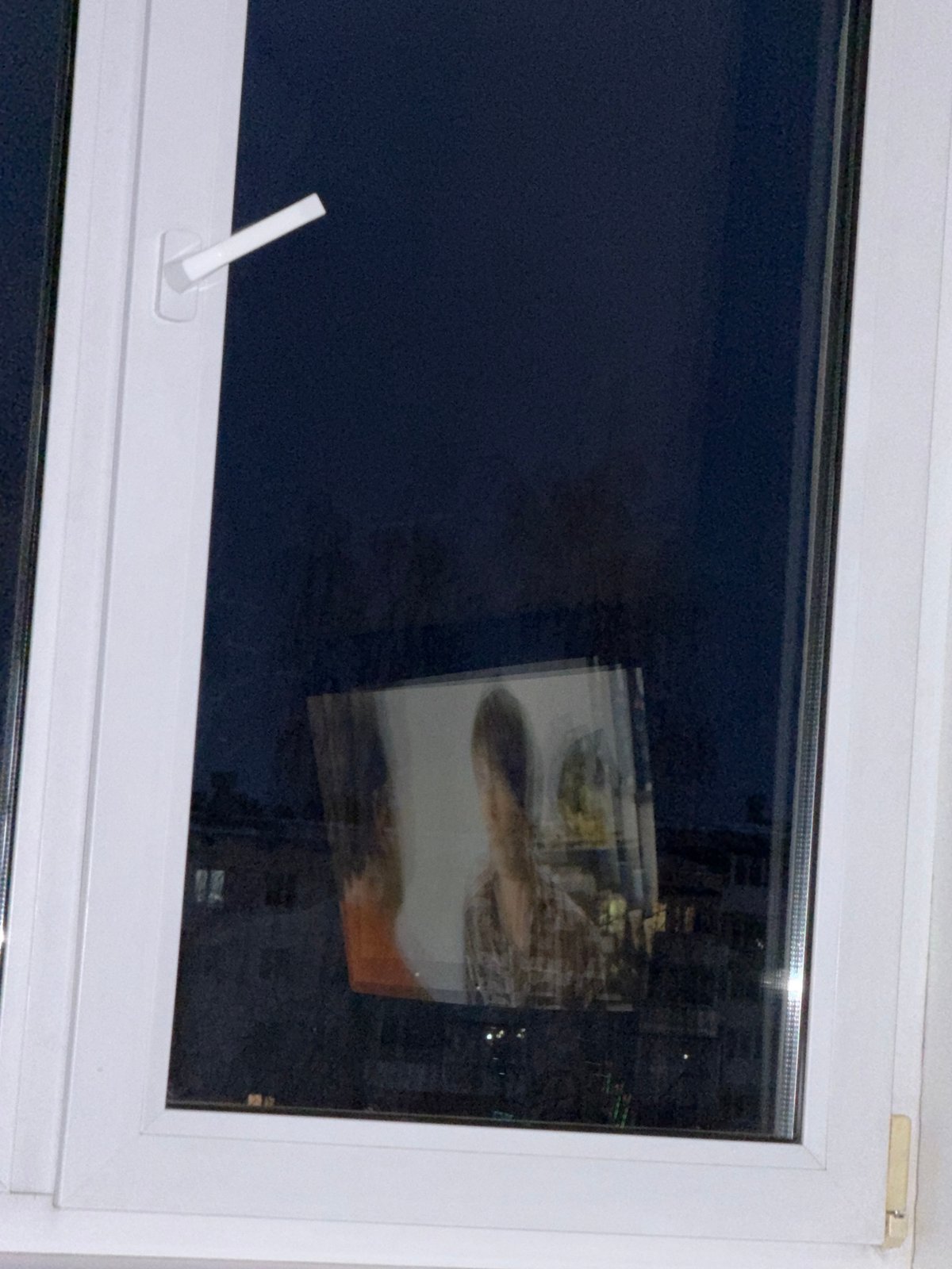 Woman with child observed in Chaikovsky park during spring thaw