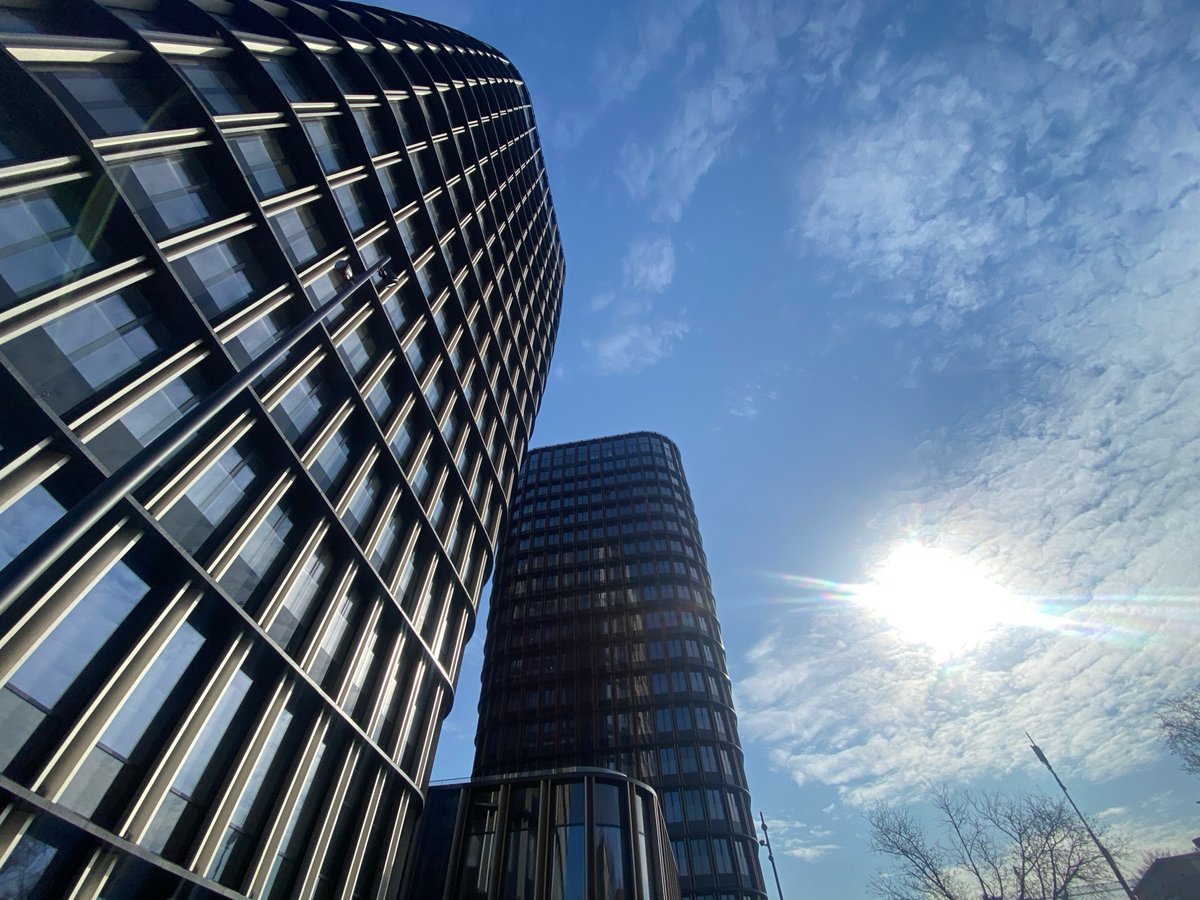 Modern high-rises photographed against blue sky in Moscow