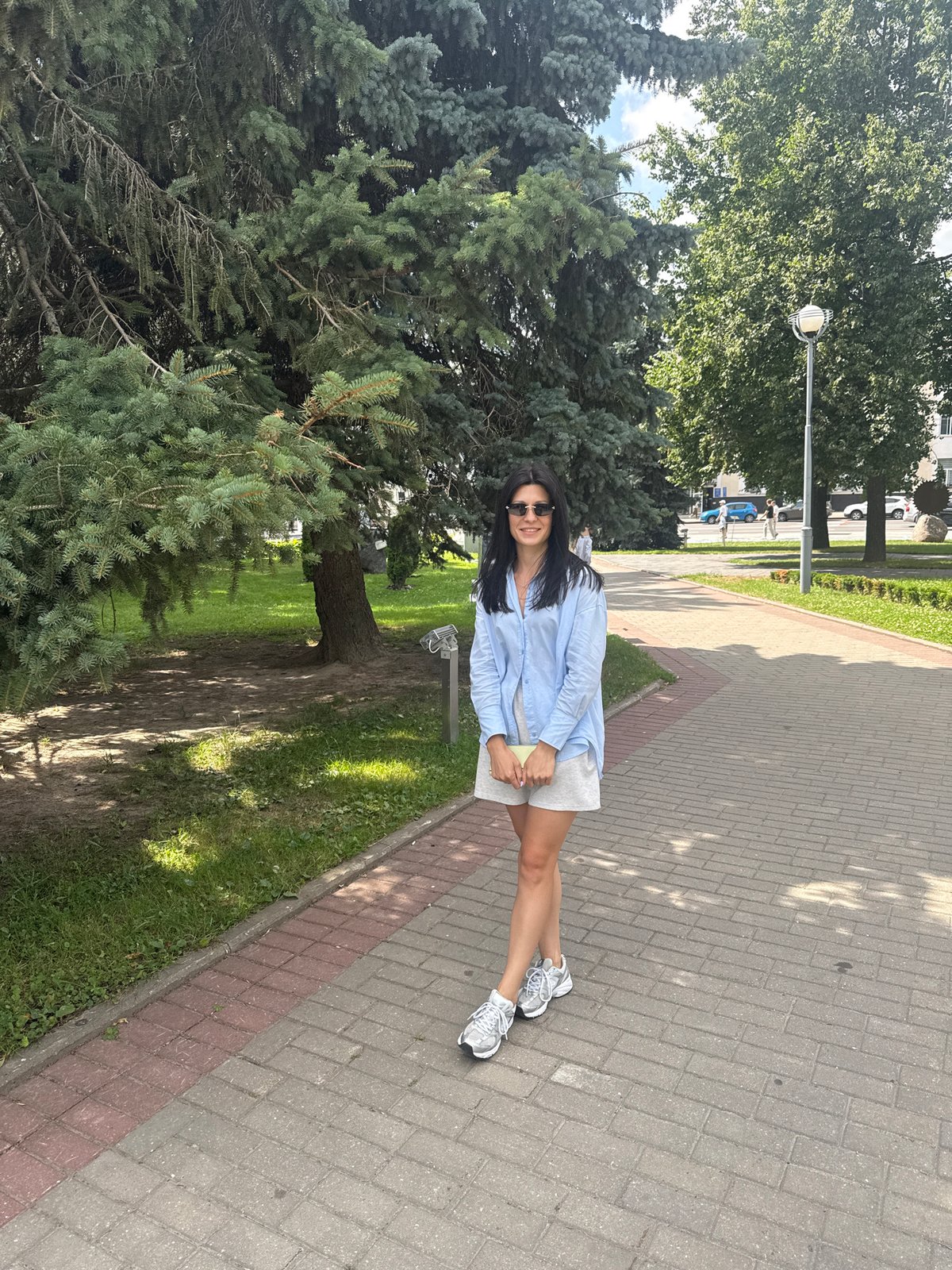 Strolling past public sculptures in a Mahilyow city park