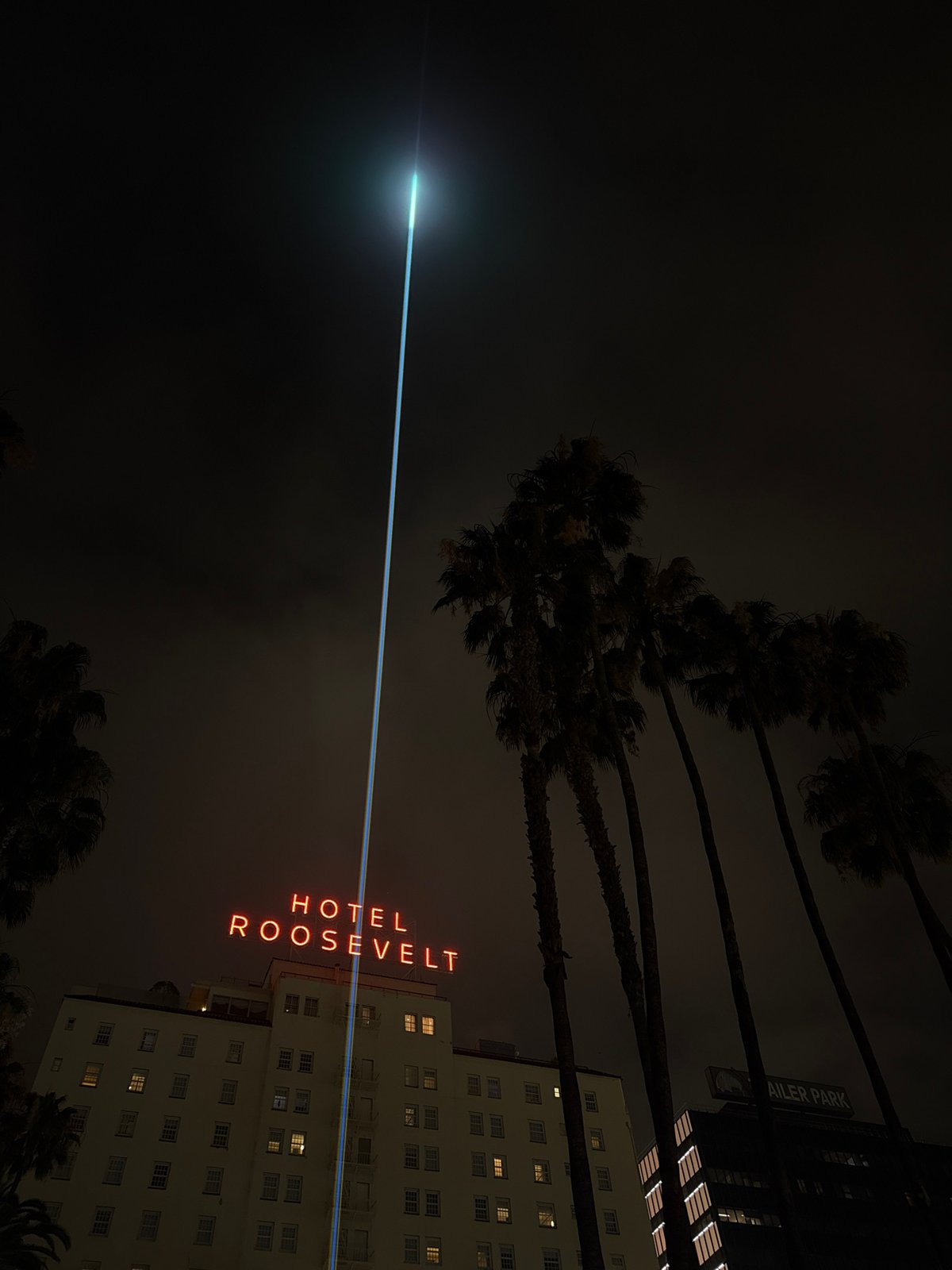 Hotel Roosevelt's neon sign illuminates Los Angeles night scene