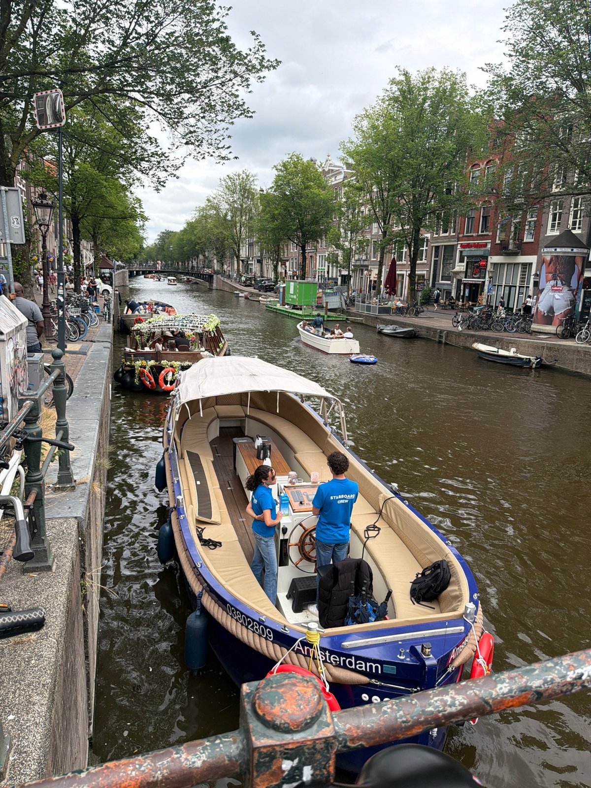 Midday stroll through Amsterdam's canals and brick streets
