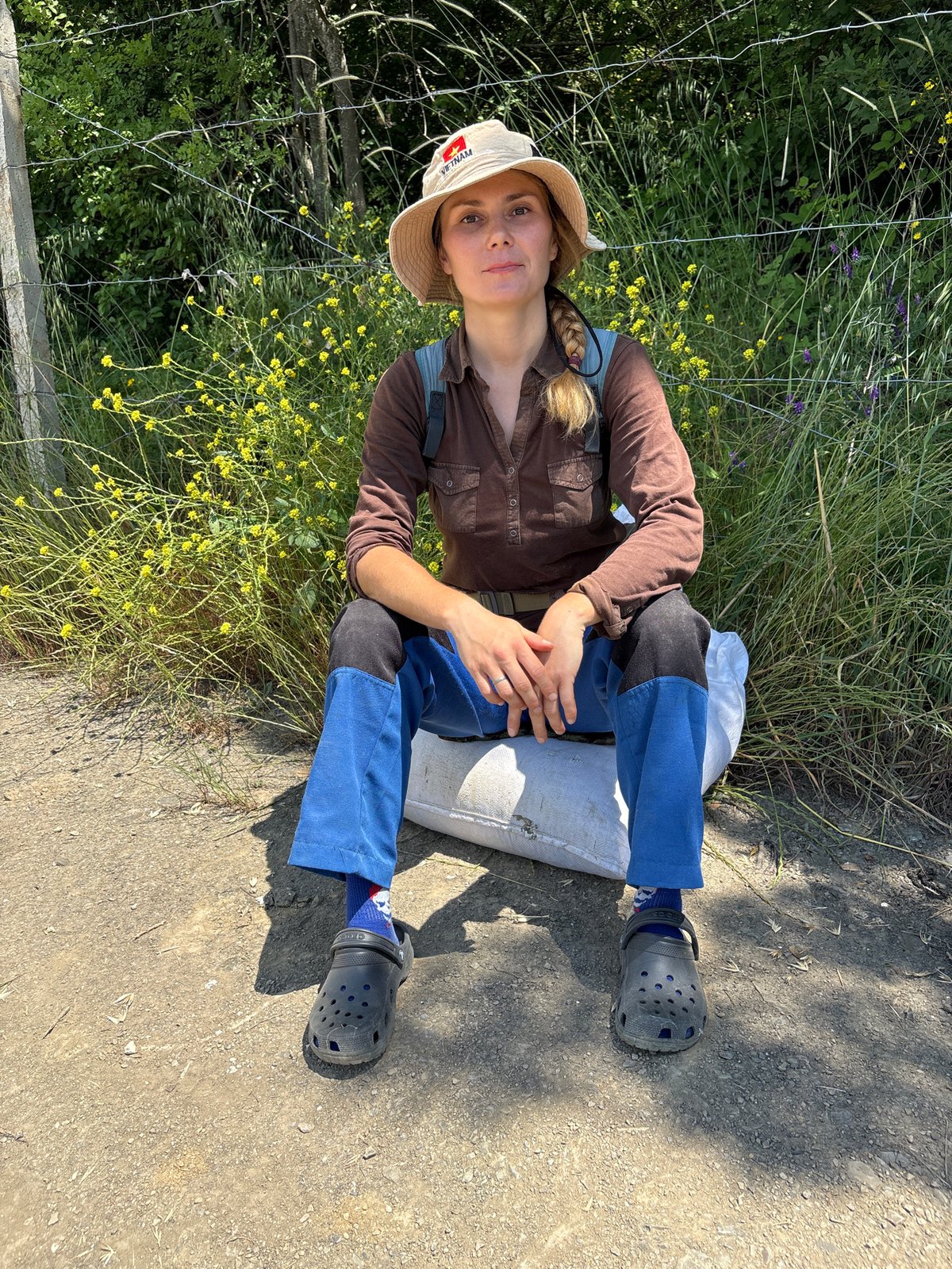Woman photographed in Ukrainian vineyard during morning hours