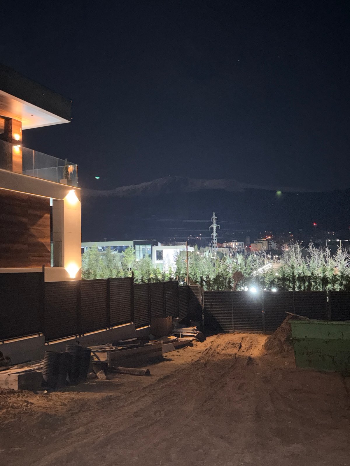 Modern building illuminated at night in Bistritsa, Bulgaria