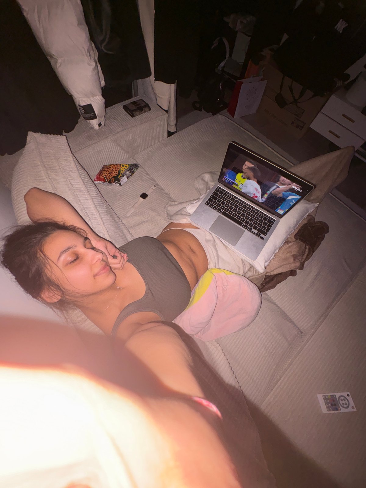 Casual evening at home, browsing on a laptop