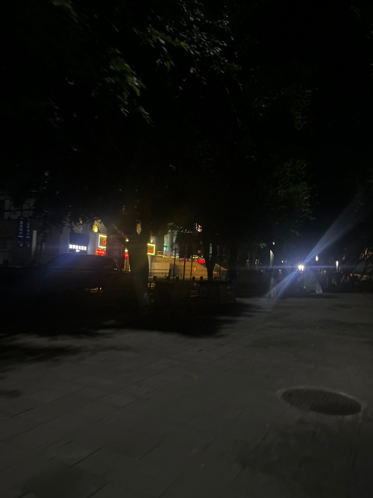 Nighttime street scenes documented in Jiulongpo District, China