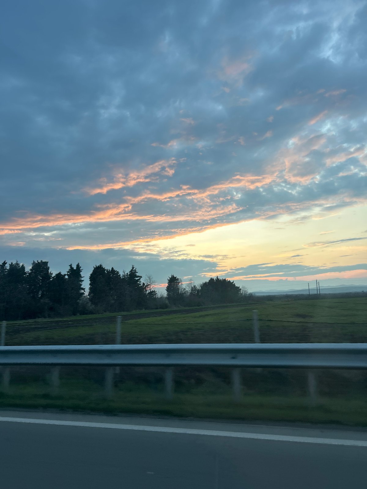 Vehicle passenger captures countryside landscape near Pomorie, Bulgaria