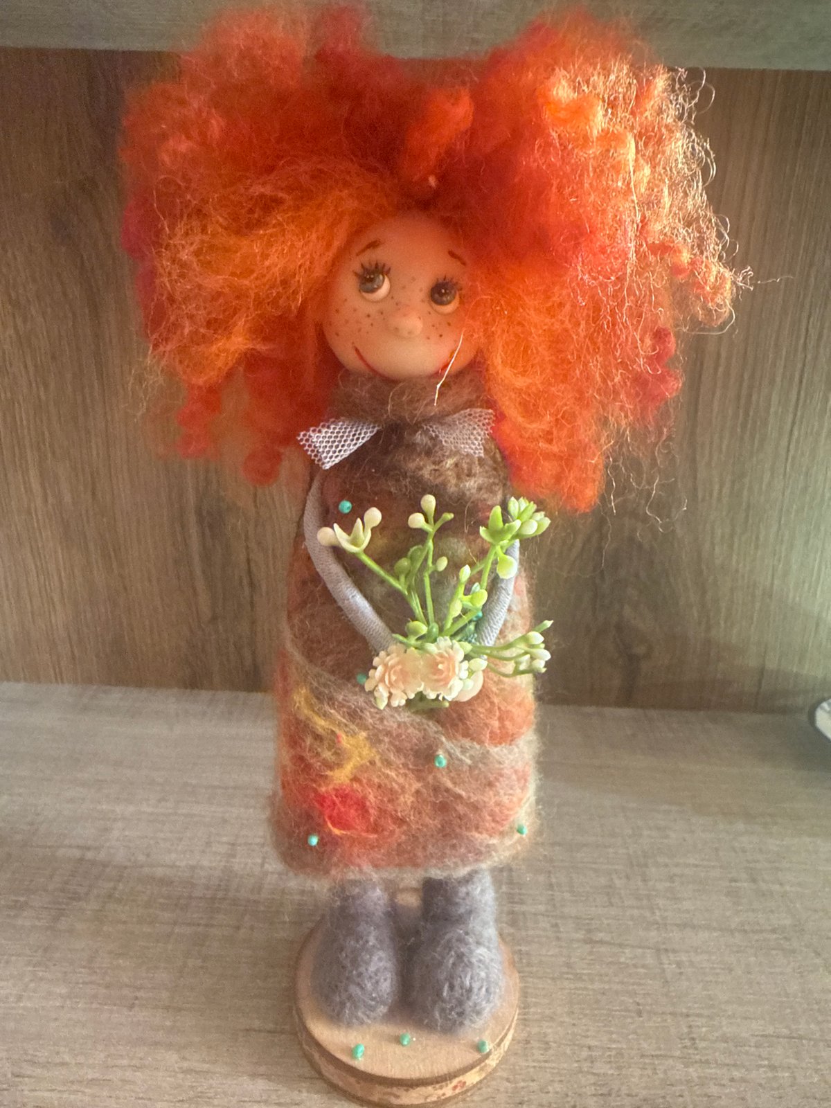 Folk art dolls with painted faces on display