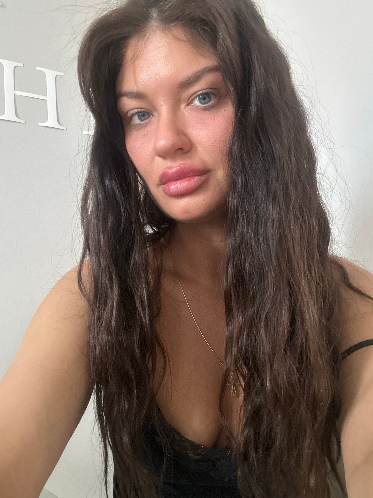 Woman photographed in Moscow apartment or indoor setting