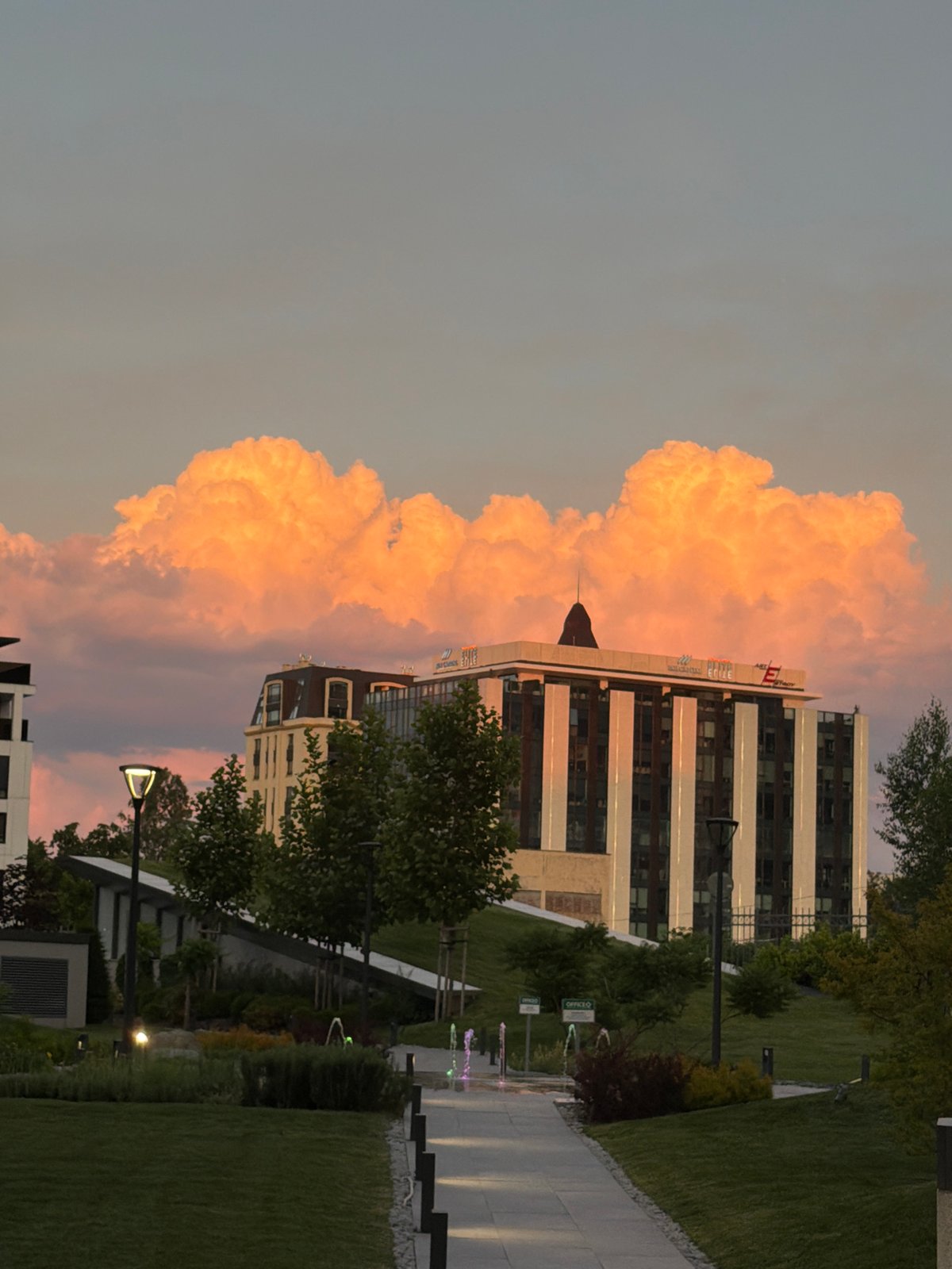 Dramatic sunset illuminates Sofia cityscape and commercial areas