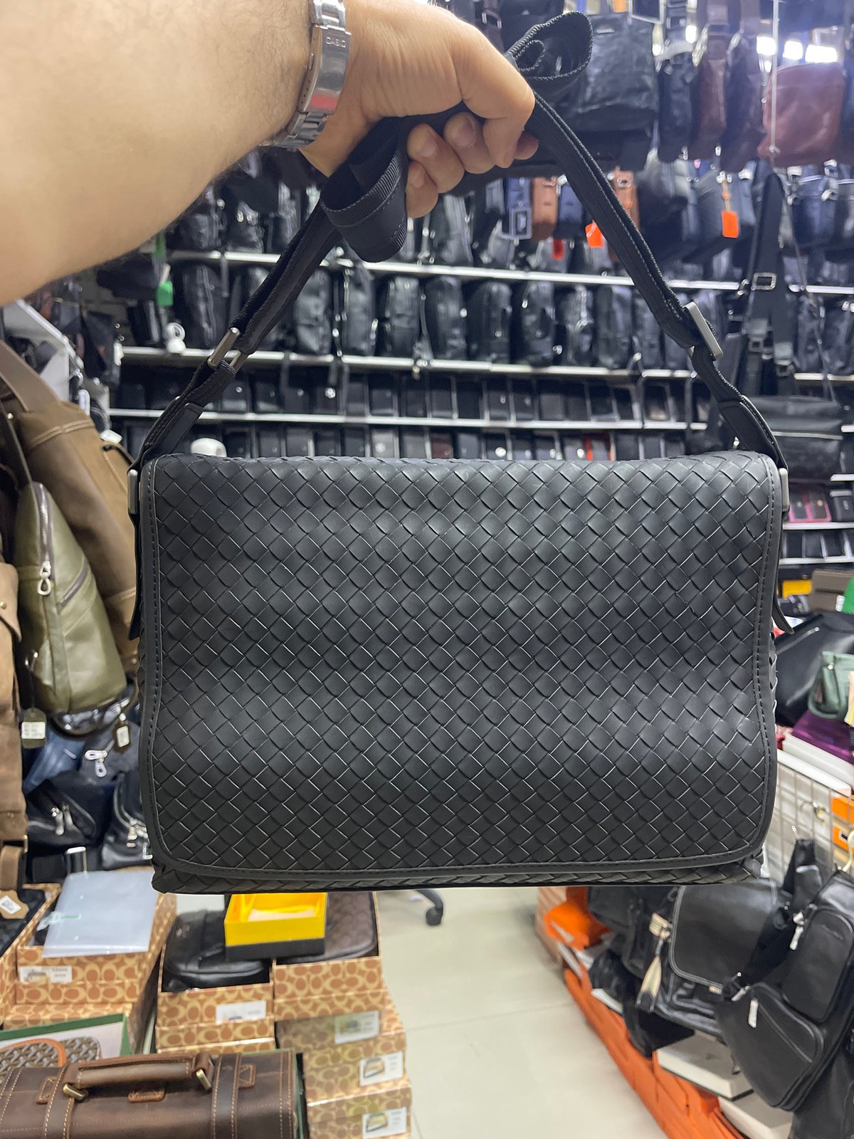 Browsing handbags at a Moscow retail store