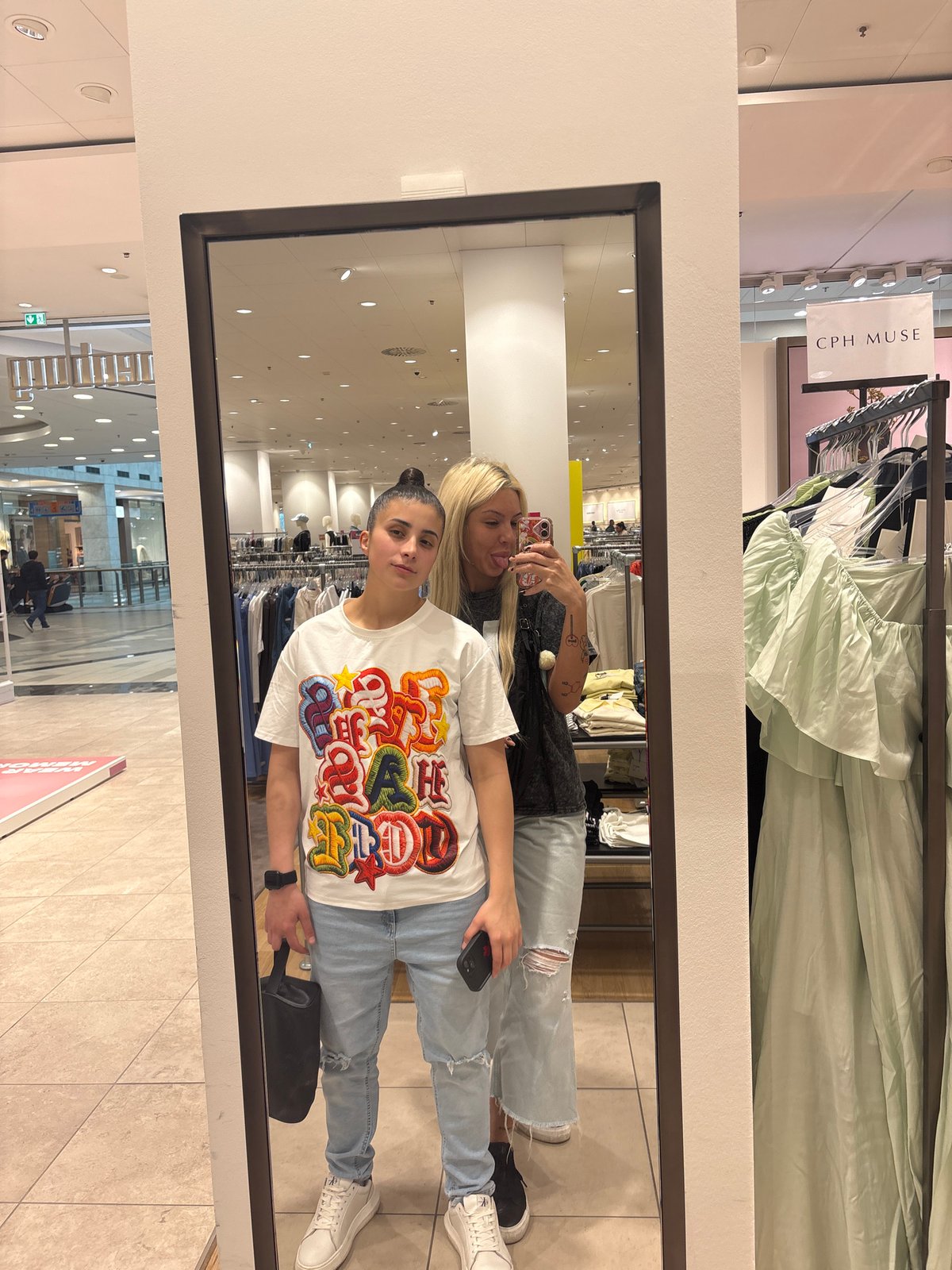 Women take mall selfie in Sofia during afternoon outing