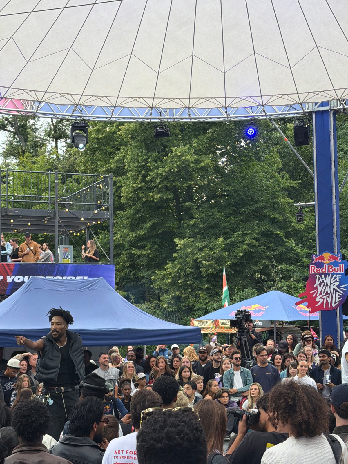 Live performance event draws a crowd under Amsterdam canopy