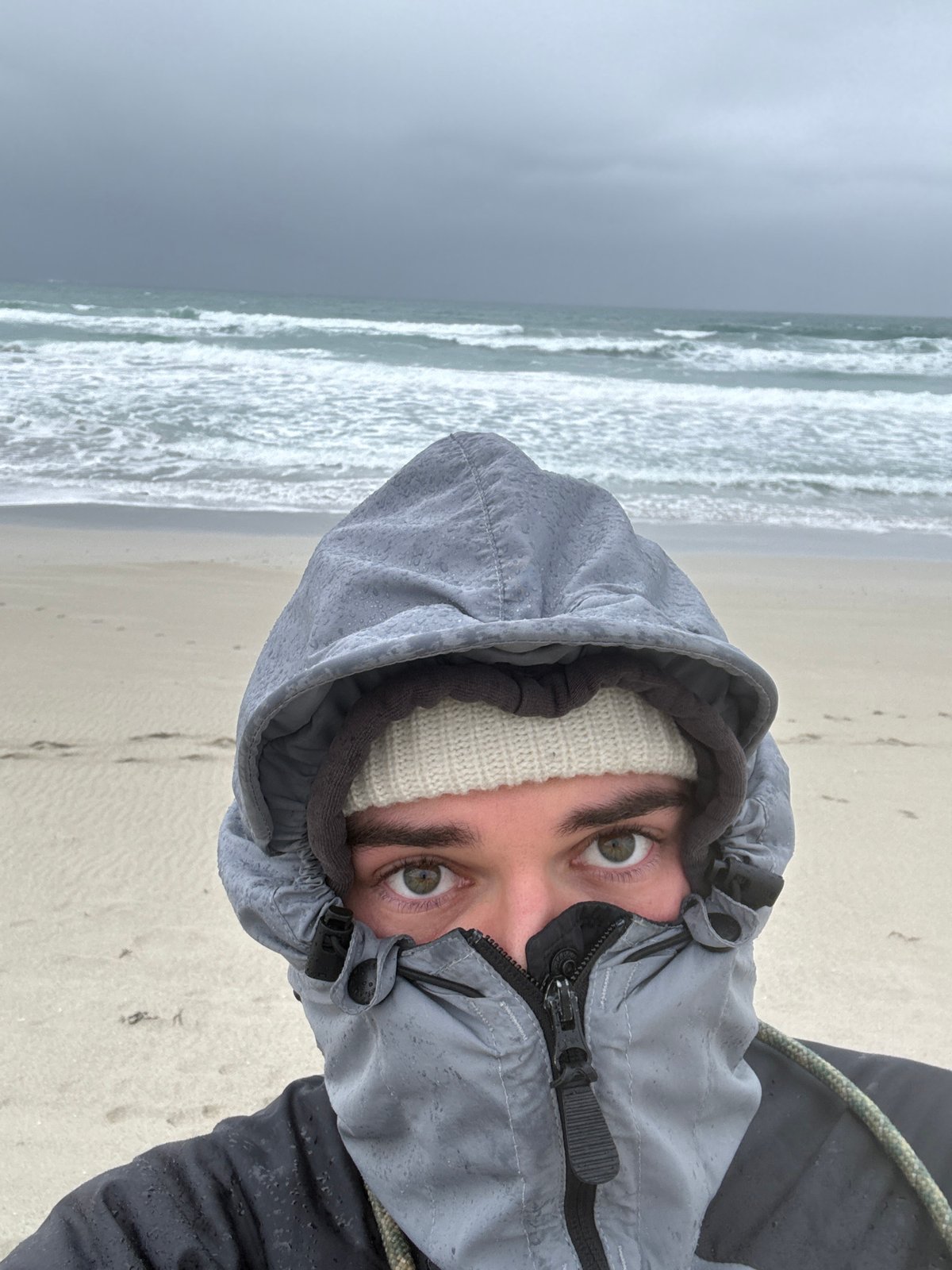 Coastal community daily life documented amid overcast spring morning
