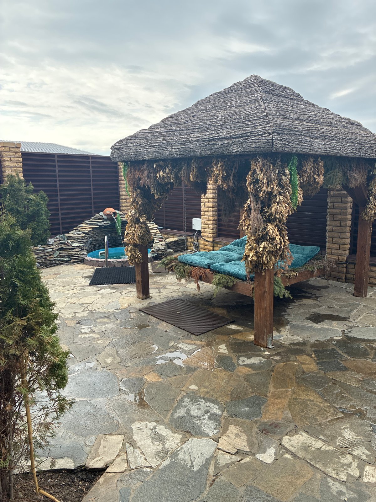 Rural outdoor structures with archery setup observed