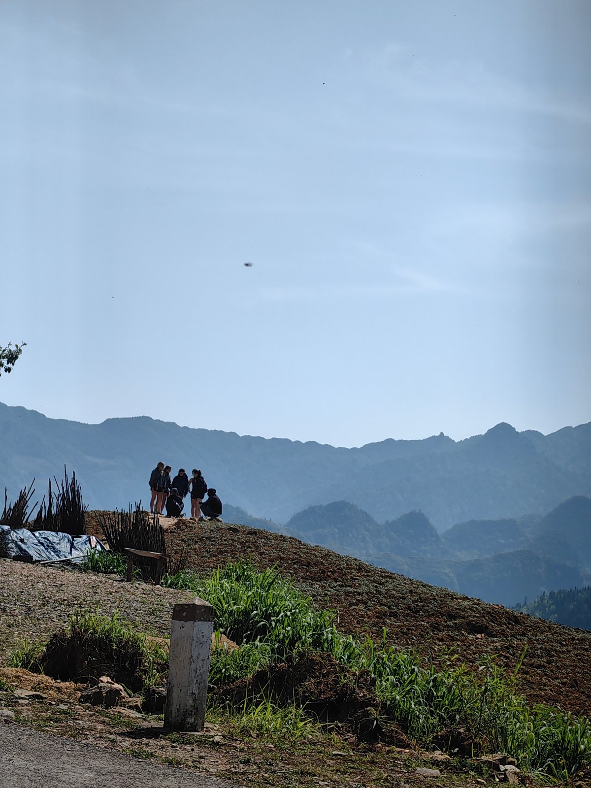 Tourist group visits scenic Lũng Cú Commune mountainous area