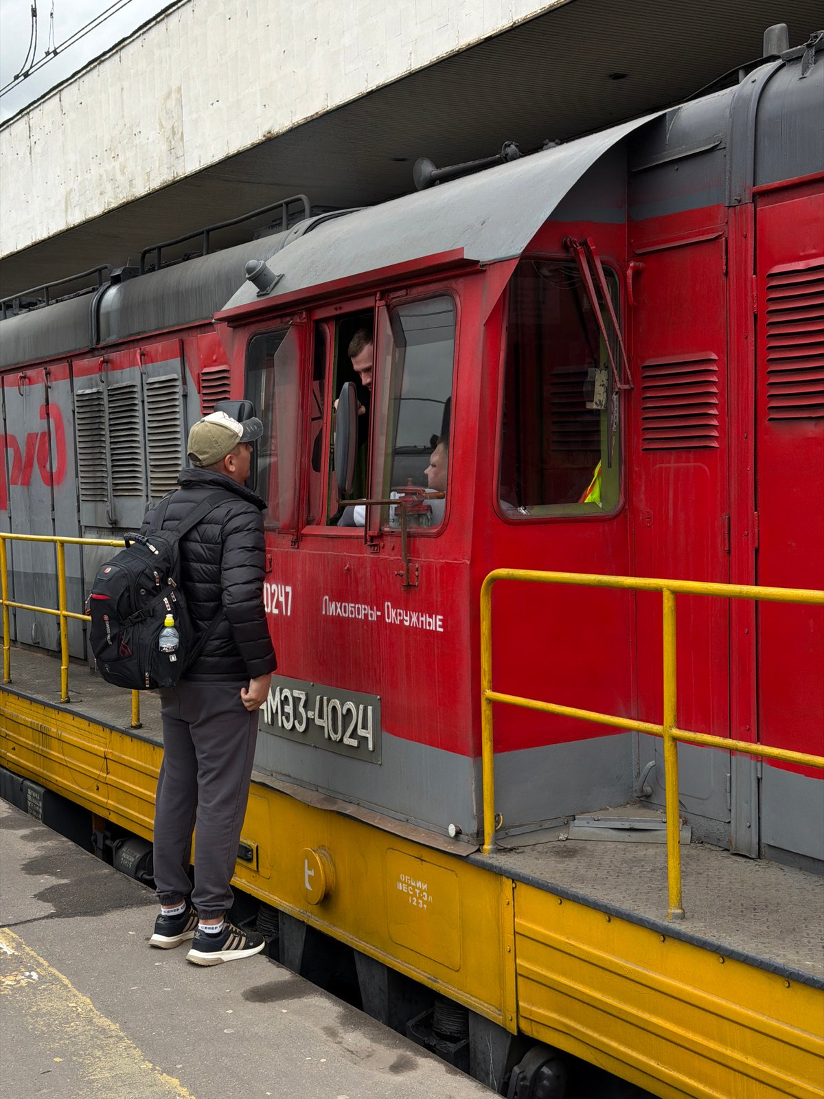 Morning commuter activity observed at Moscow train station and streets