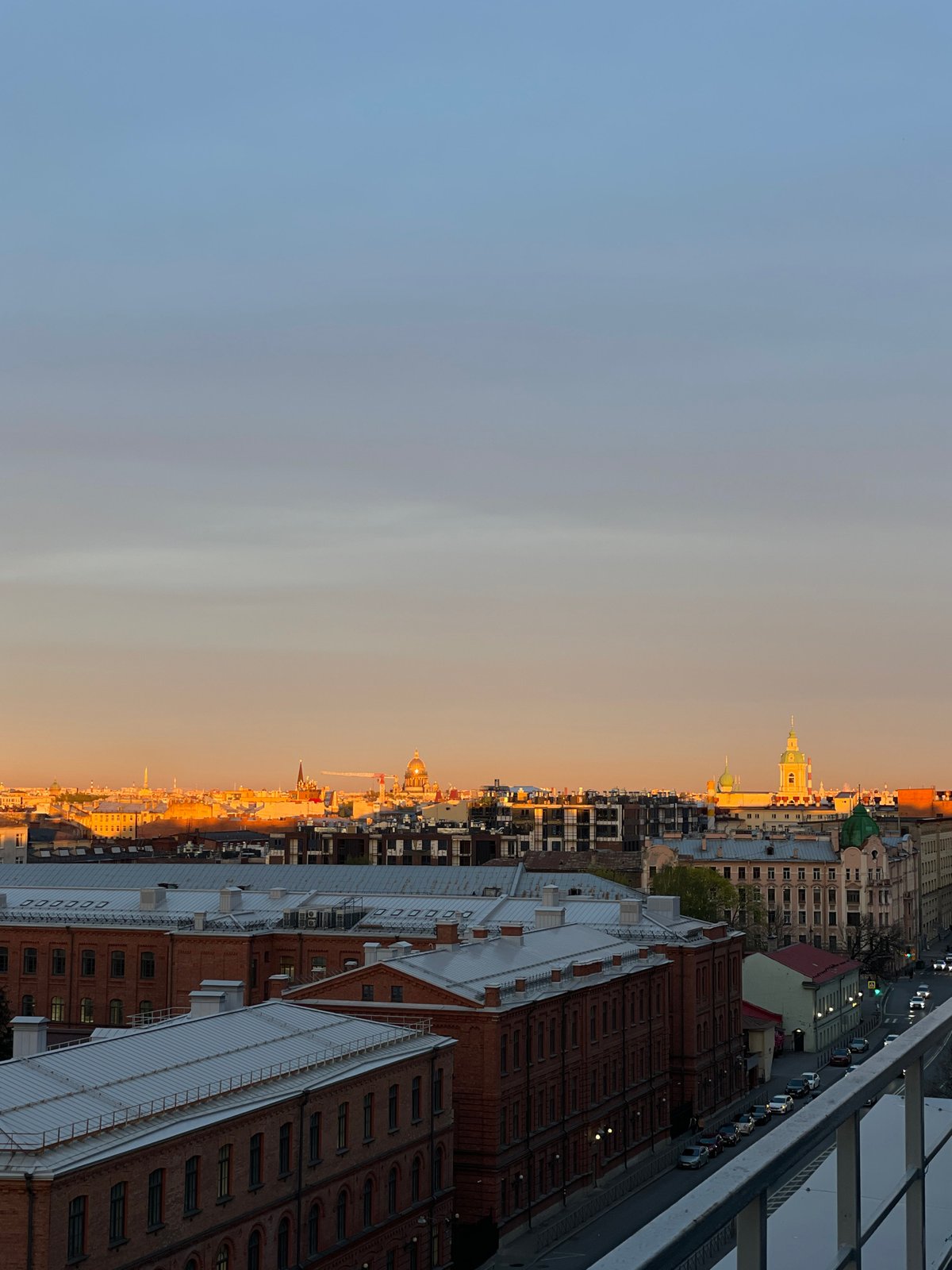 Evening snapshots document Saint Petersburg cityscapes and personal moments