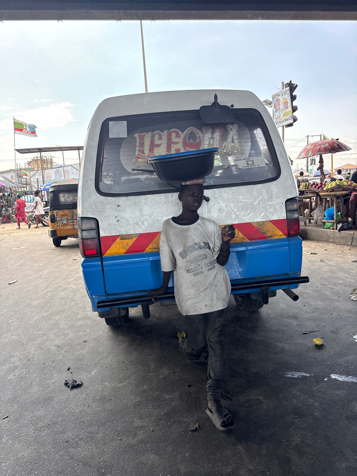 Lekki street life pushes on through heavy flooding and market bustle