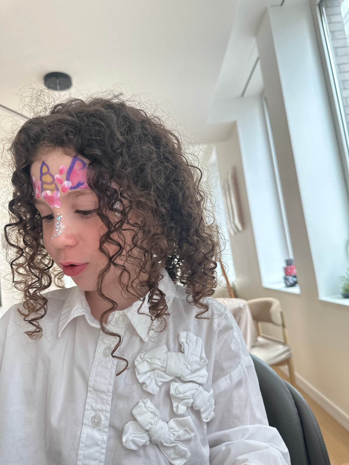 Family moments and face painting captured across NYC evening