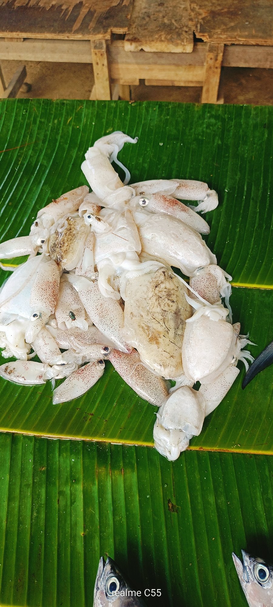 Roadside seafood vendors operate morning markets in Lhokseumawe Indonesia