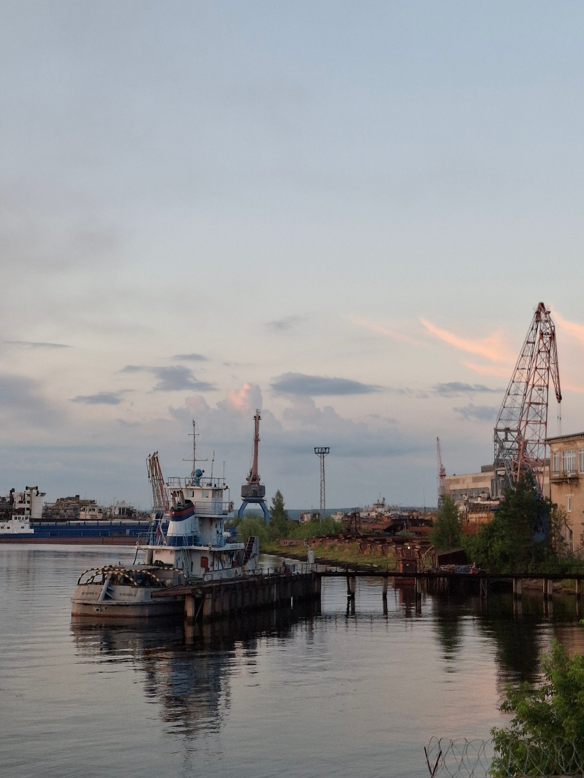 Sunset evening at Chaikovsky's industrial Kama River waterfront