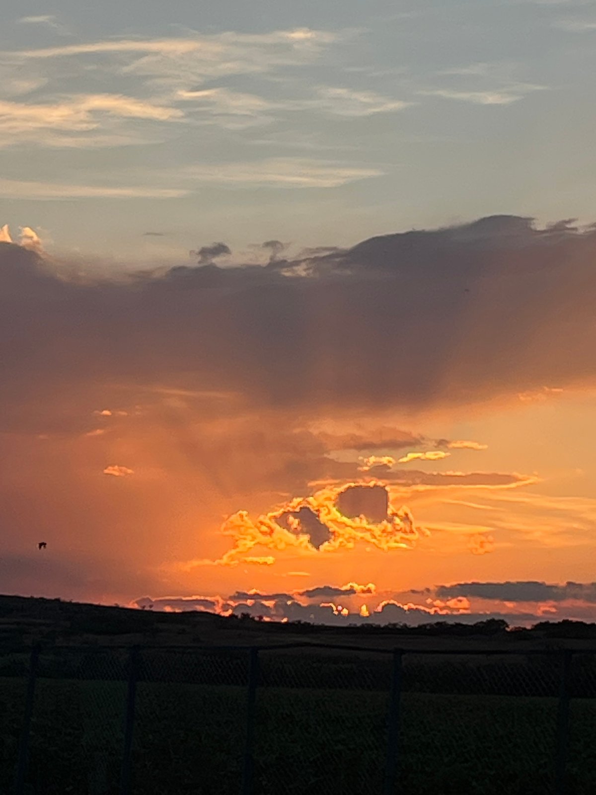 Layered sunset sky over rural Belozem, Bulgaria