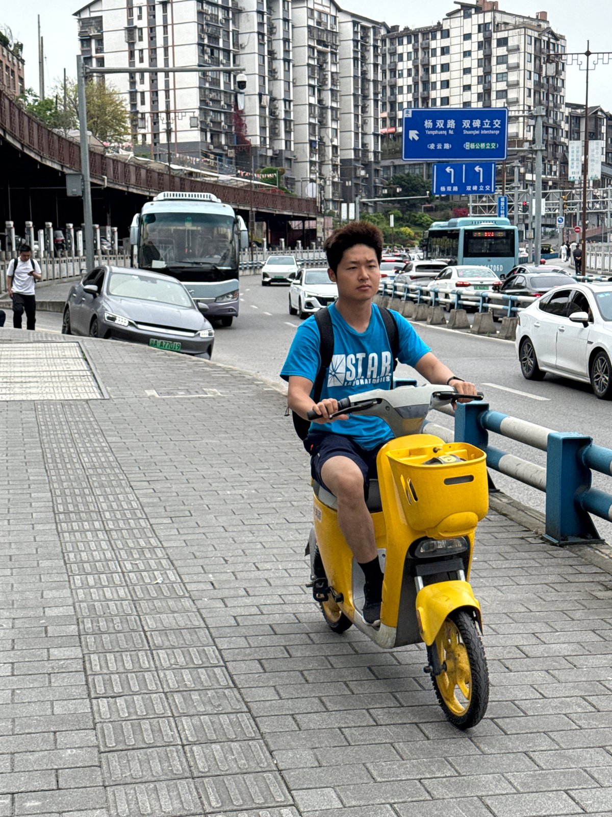 Morning scooter traffic observed in Shapingba District, China