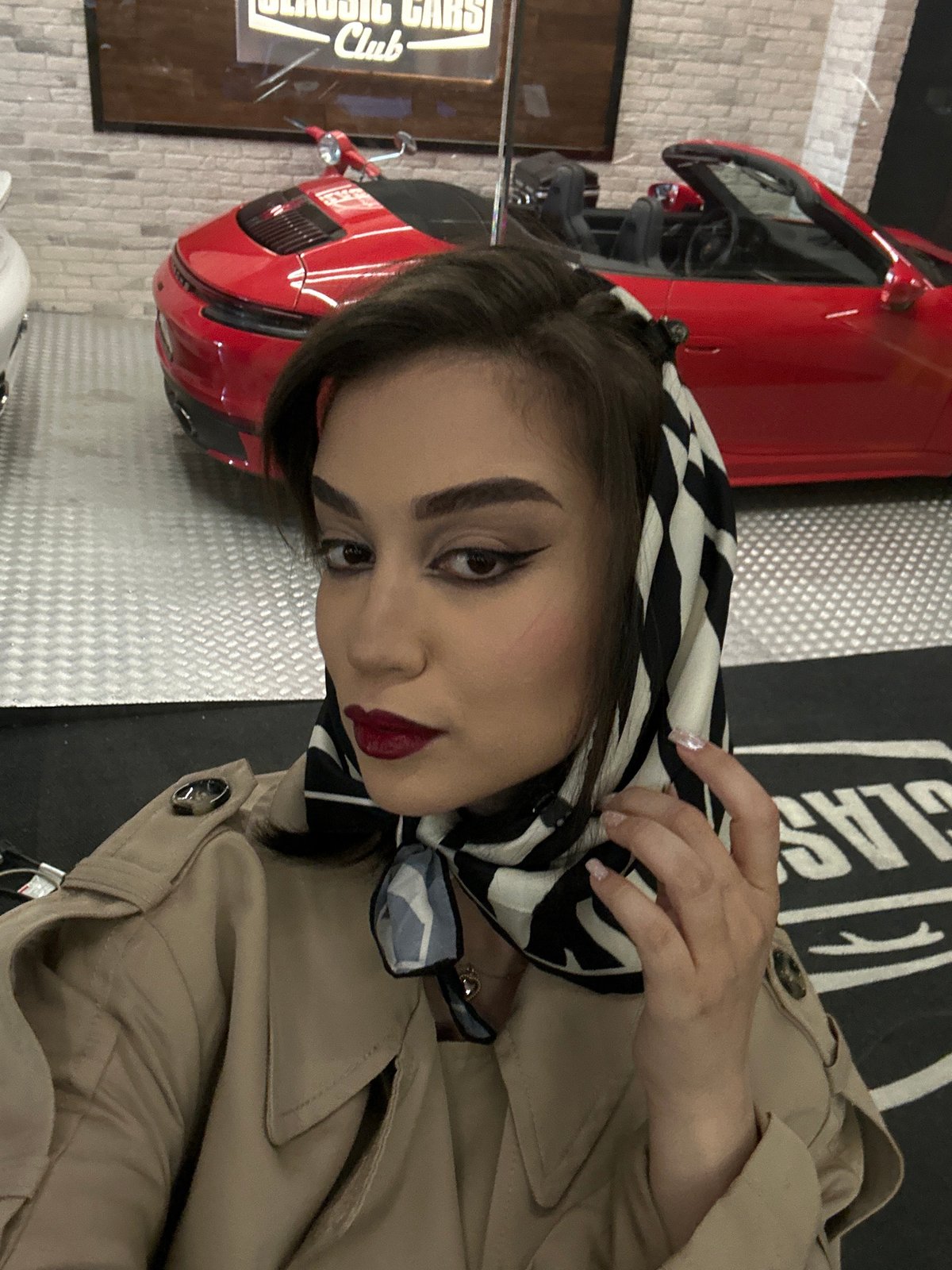Woman in patterned headscarf photographed in Sofia