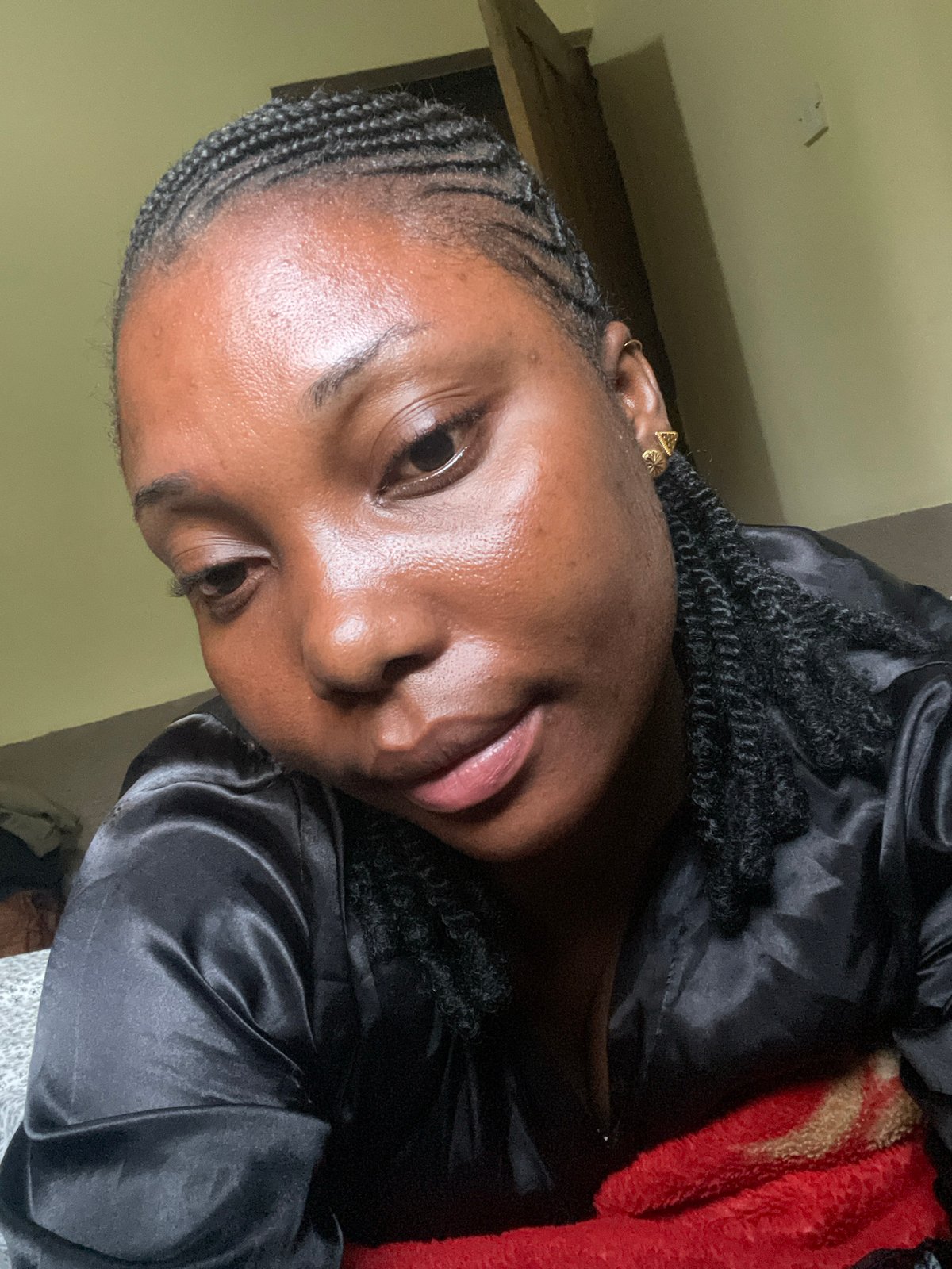 Woman photographed in intimate morning portraits in Jos, Nigeria