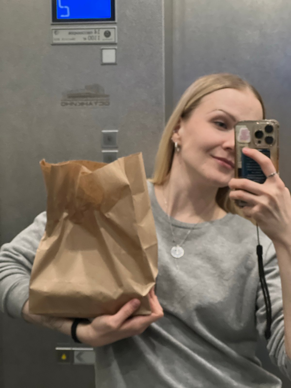 Indoor scenes documented in Khimki including elevator selfie