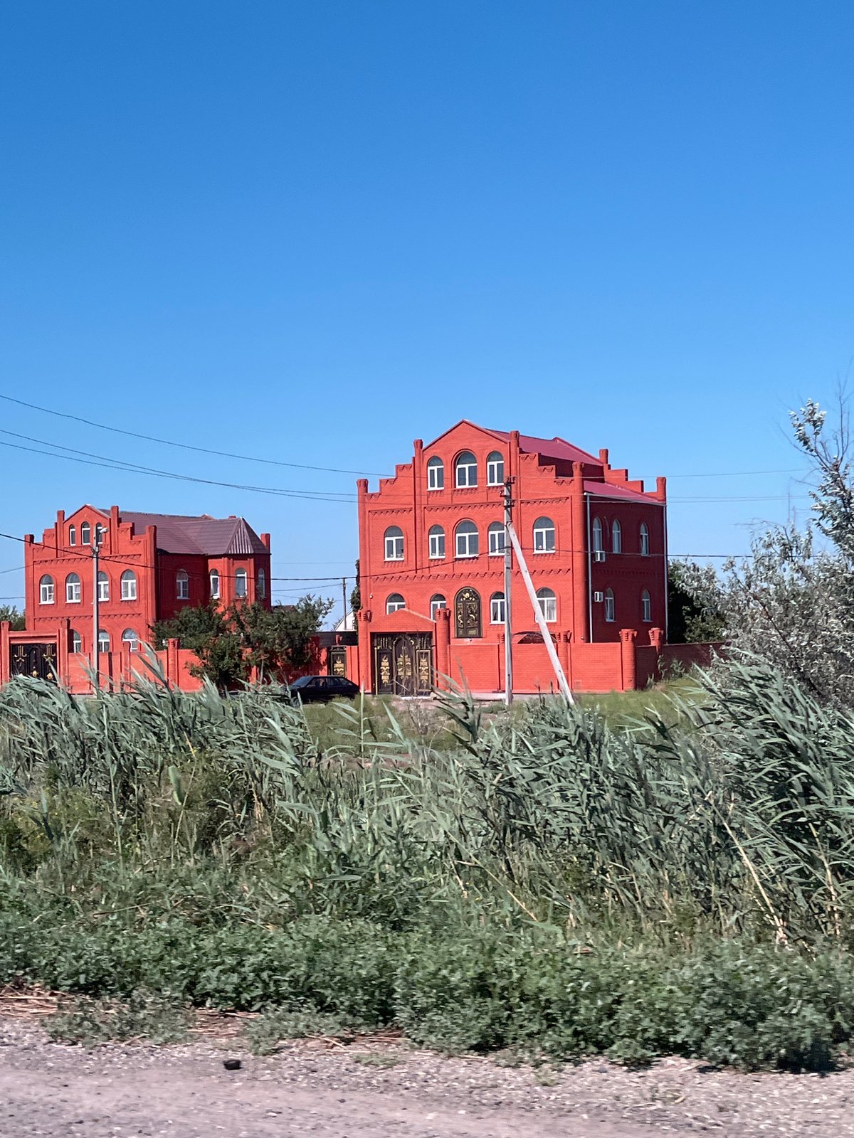 Red brick houses and a calm river canal in Astrakhan