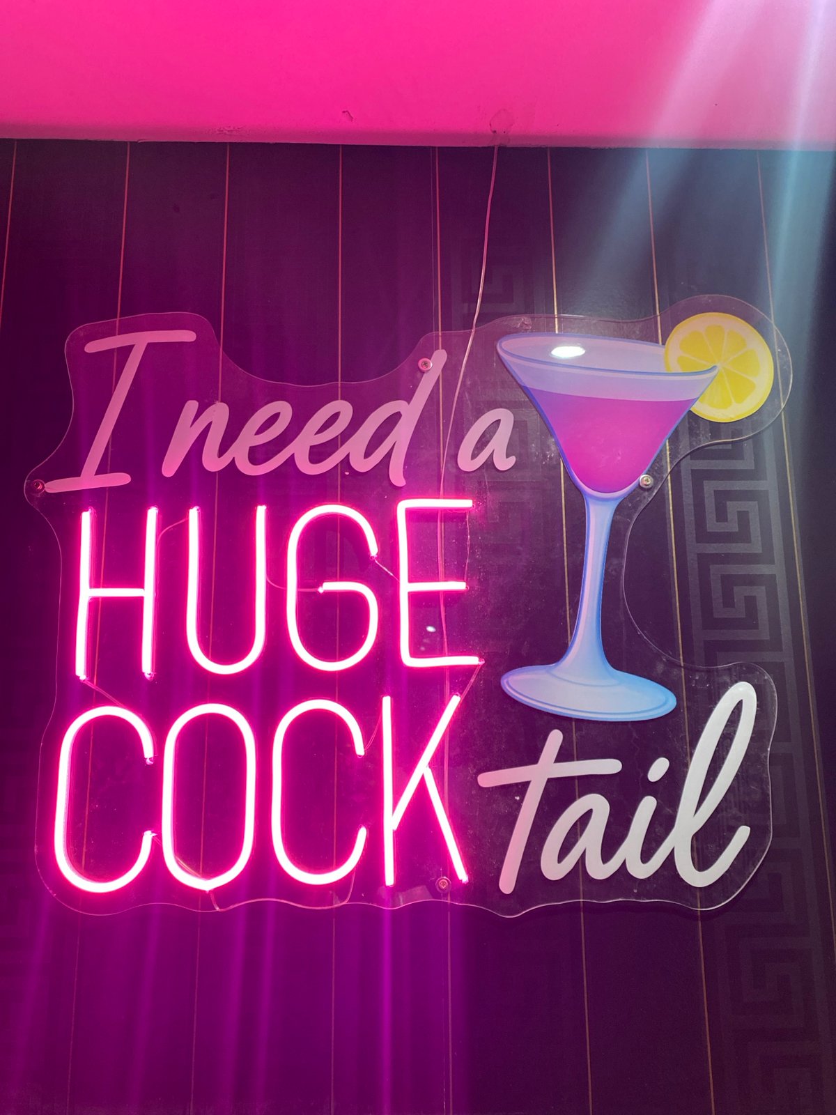 Neon cocktail sign spotted in central London