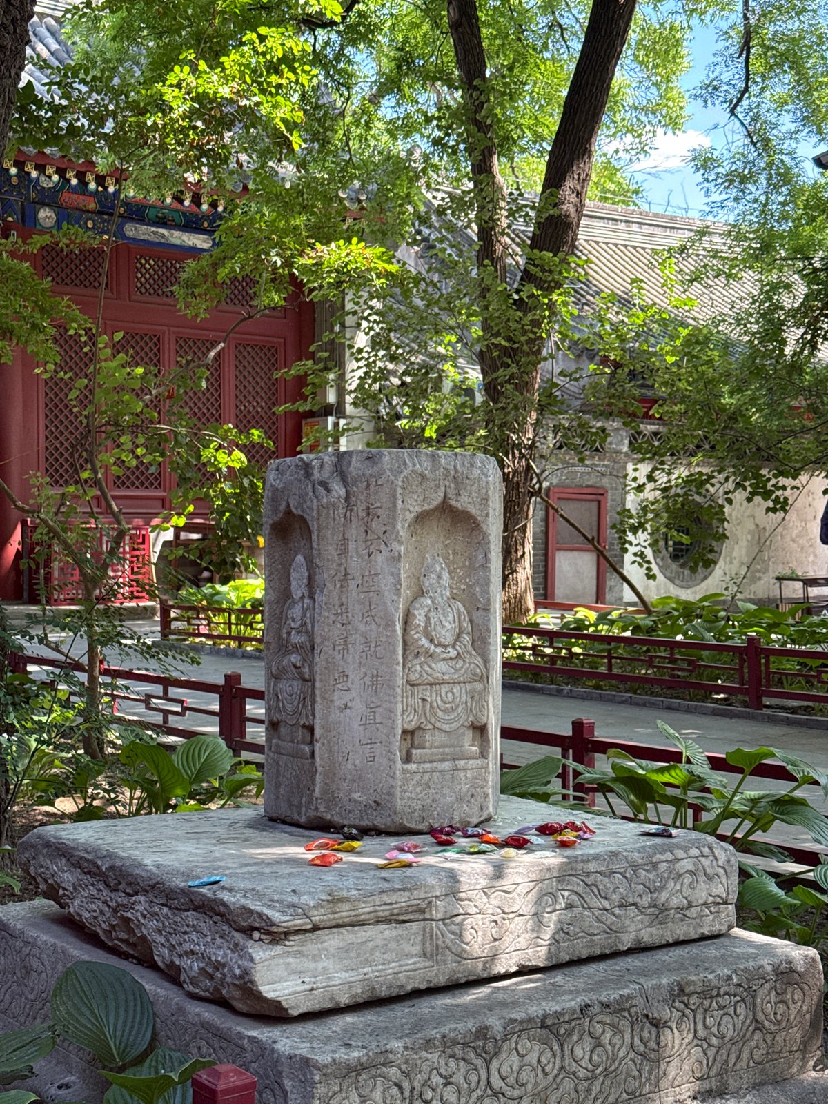 Stone monument with carvings documented at outdoor historical site