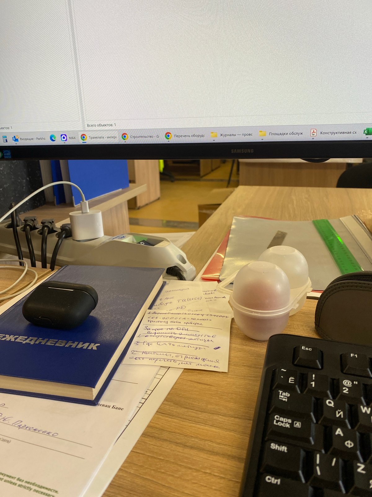 Office workspace documented in Luzhitsy, Russia