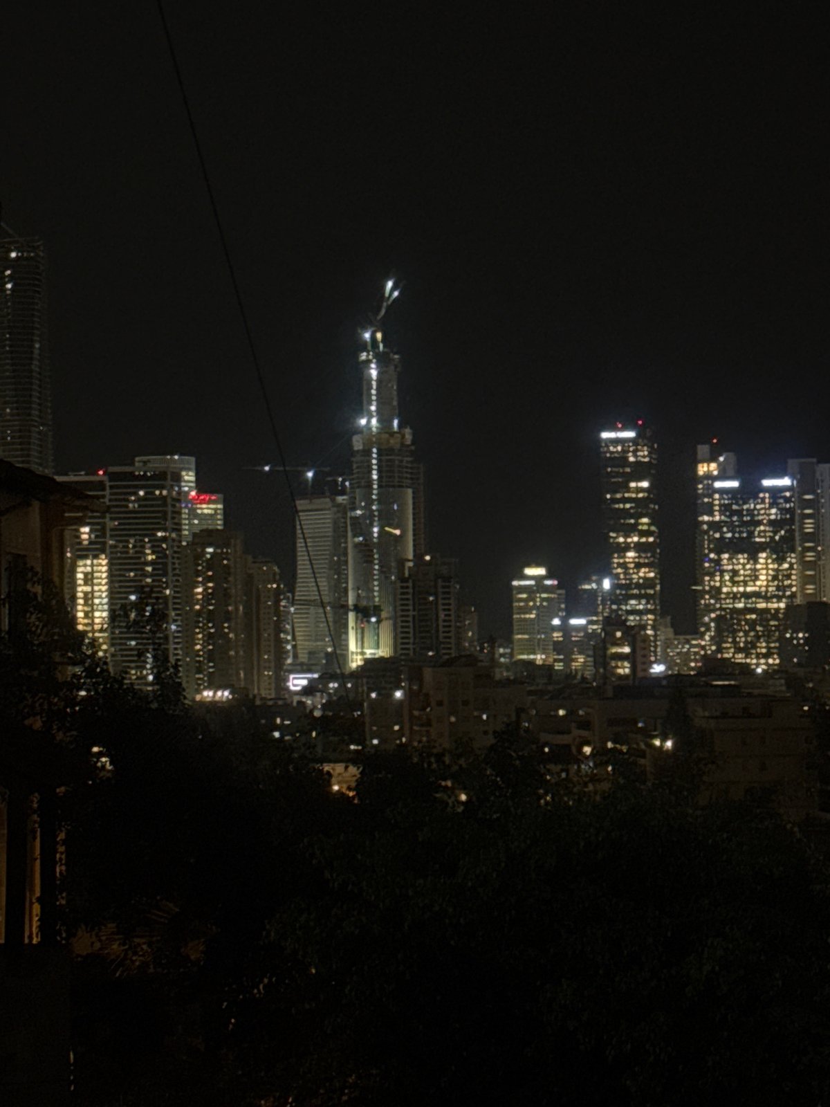 Nighttime Tel Aviv skyline photographed from Givatayim viewpoints