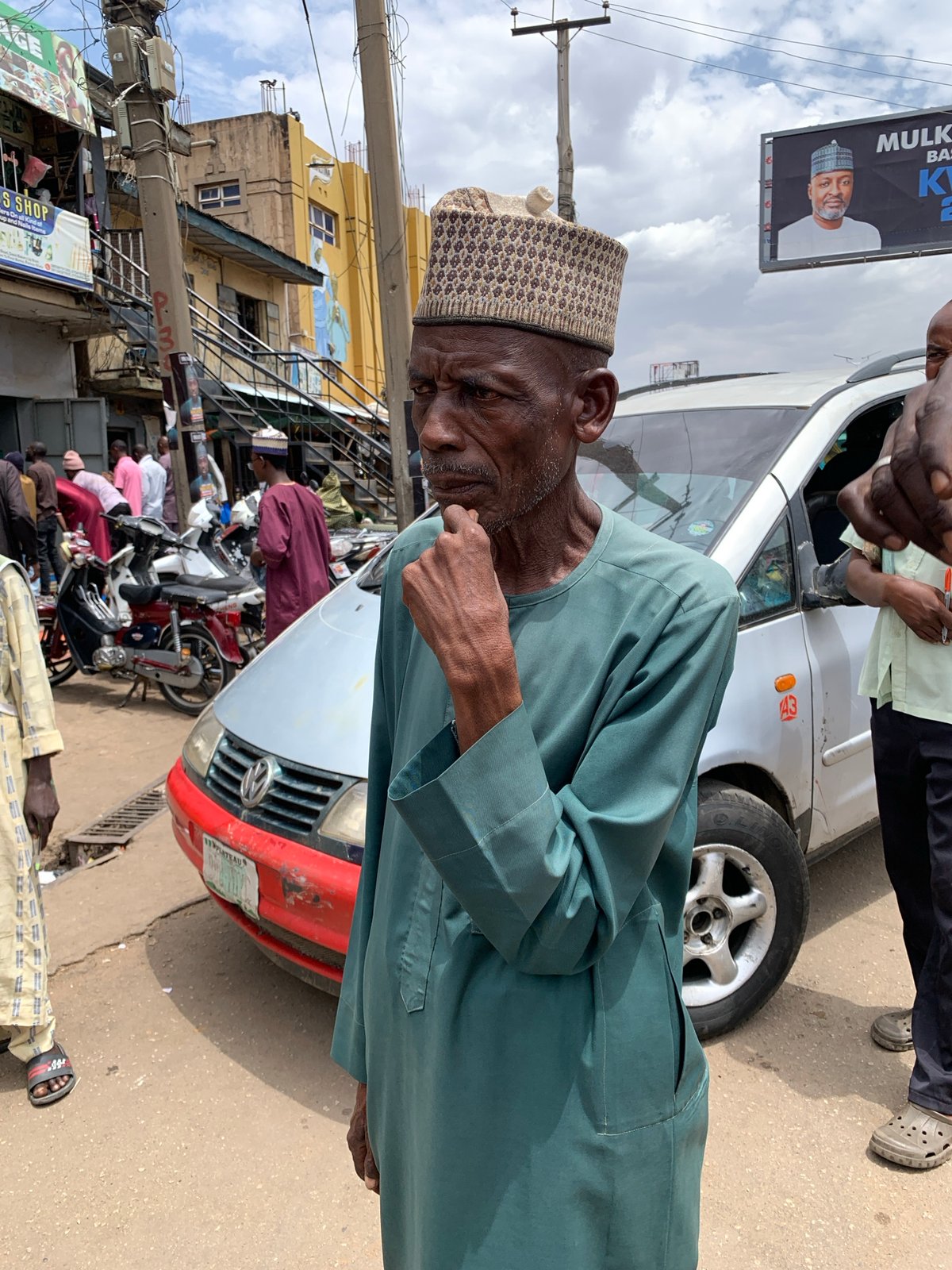 Daily life unfolds on Jos streets during midday hour