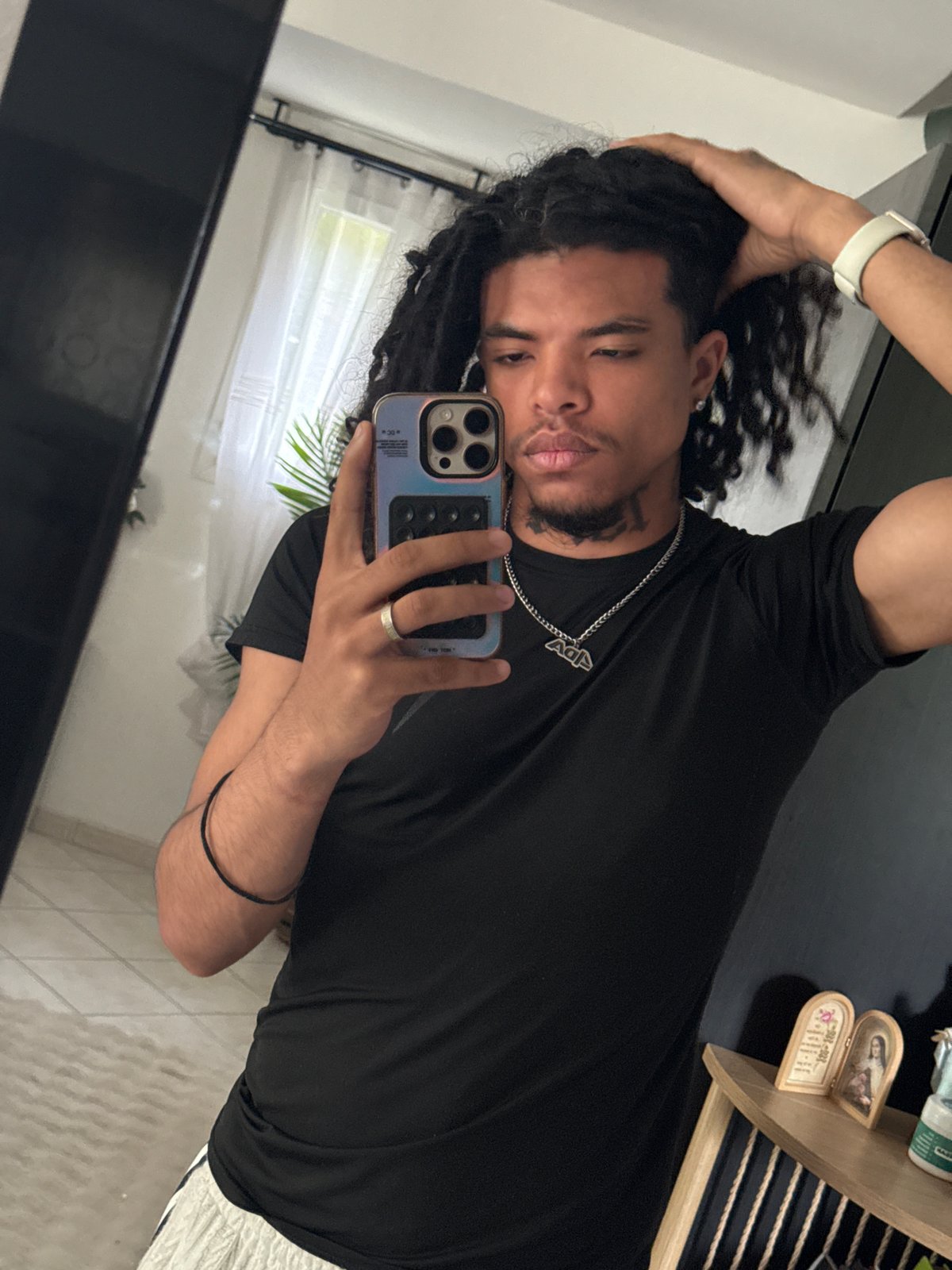 Young man takes mirror selfies in Beuvillers residence