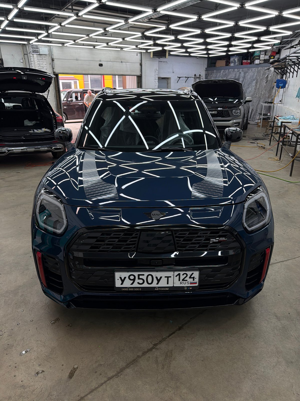 Window tinting session underway at a Krasnoyarsk detailing shop