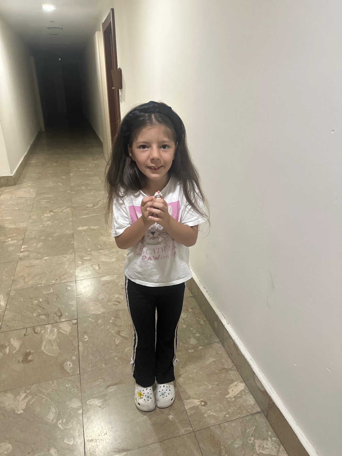 Young girl shops for strawberries in Esenyurt, Turkey