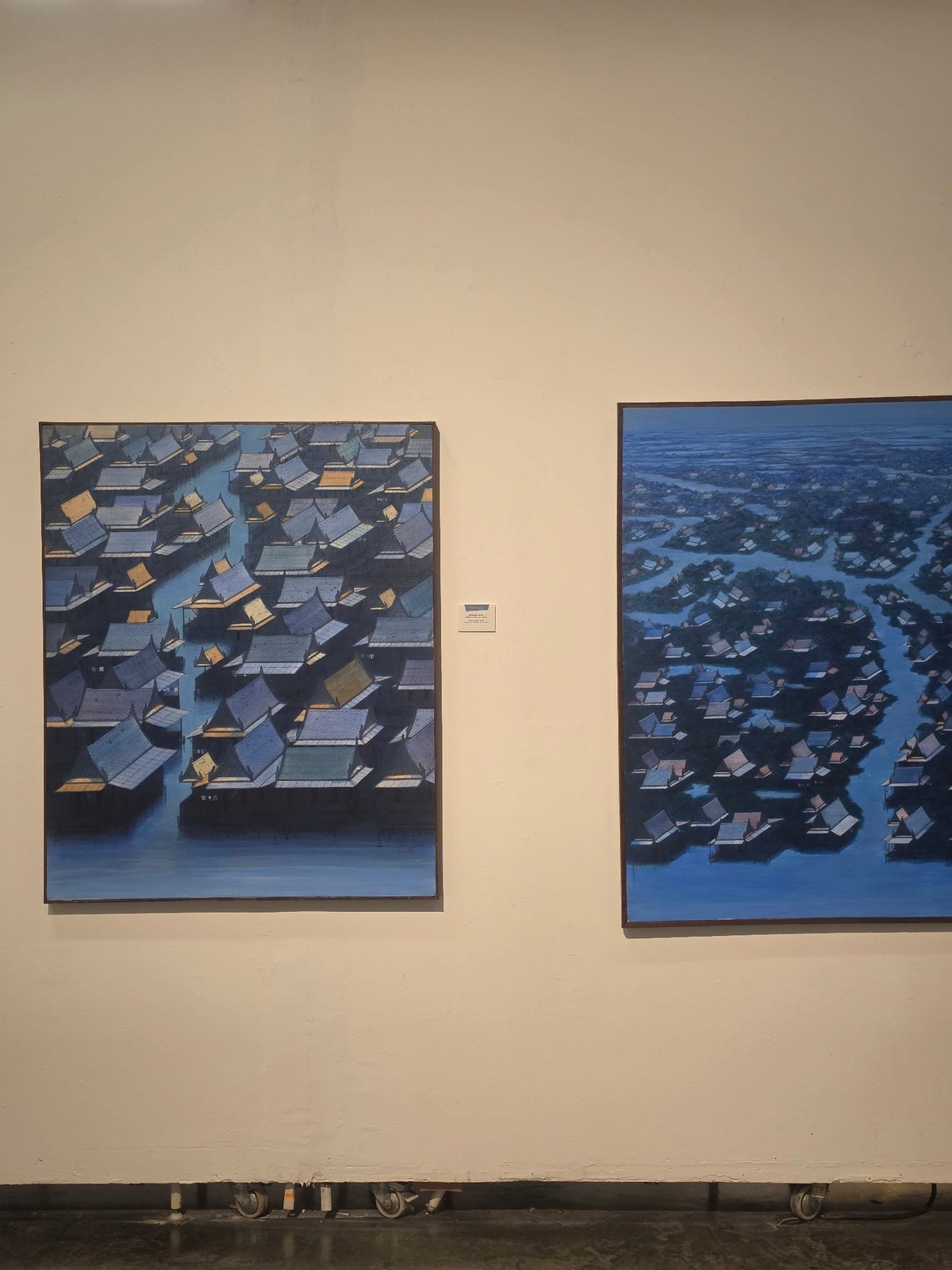 Art exhibition documentation captured in Bangkok gallery space