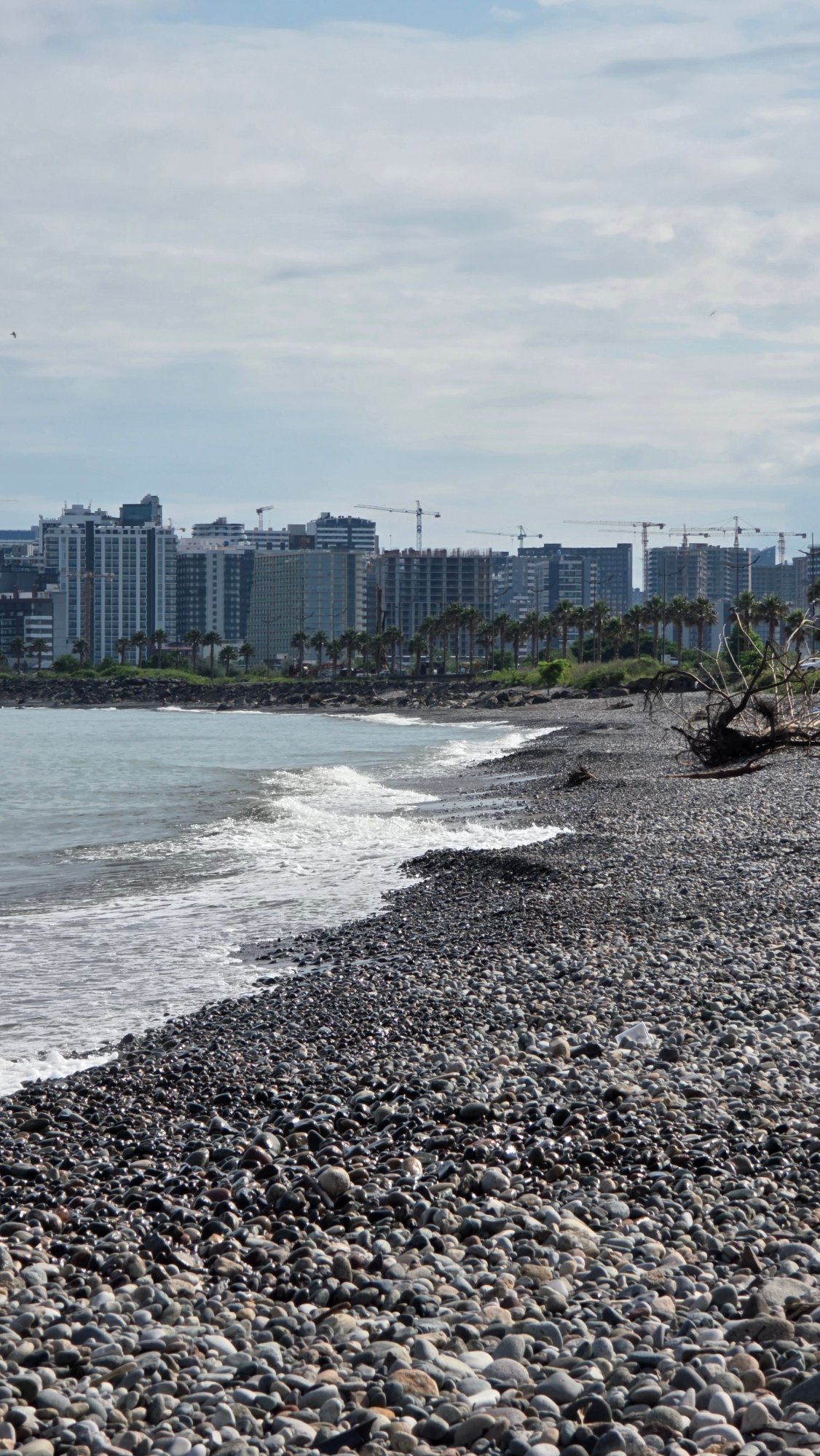 Lazy morning on Batumi's Black Sea shore, planes and all