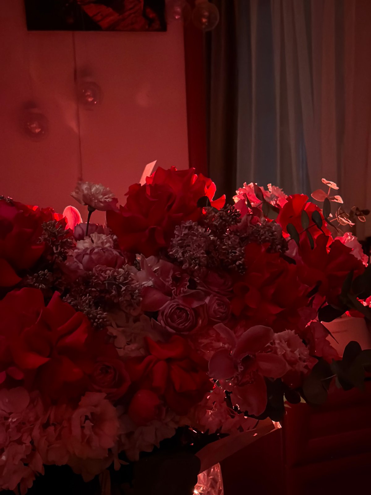 Flower bouquet photographed under dim lighting in Moscow